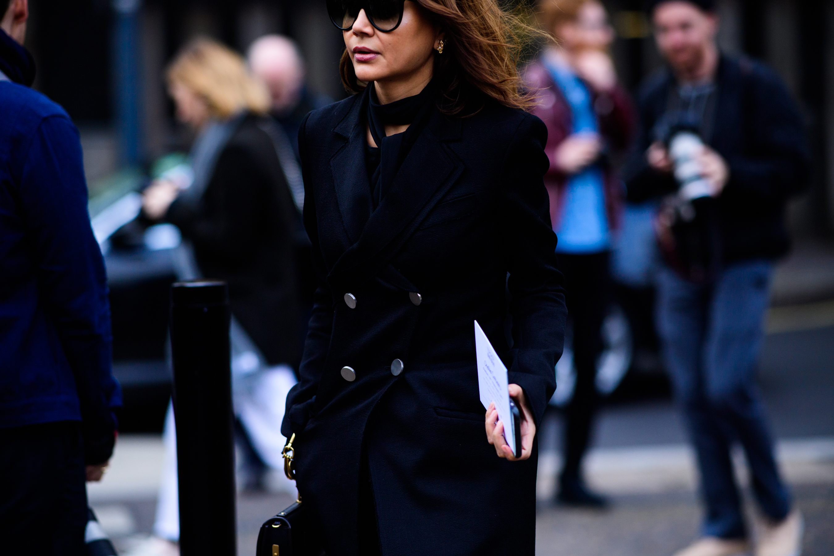 Woman wearing black coat