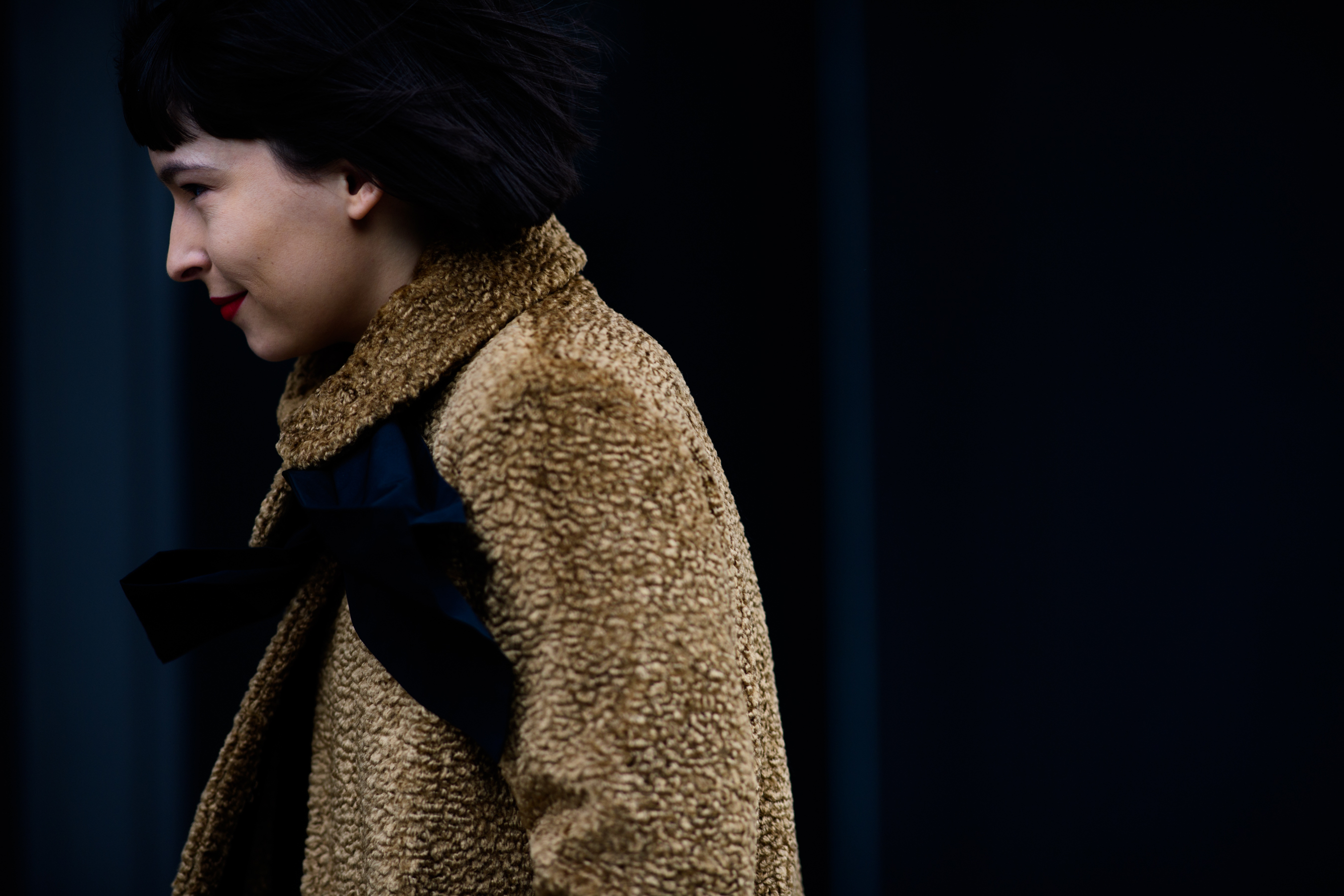 Woman wearing faux fur coat
