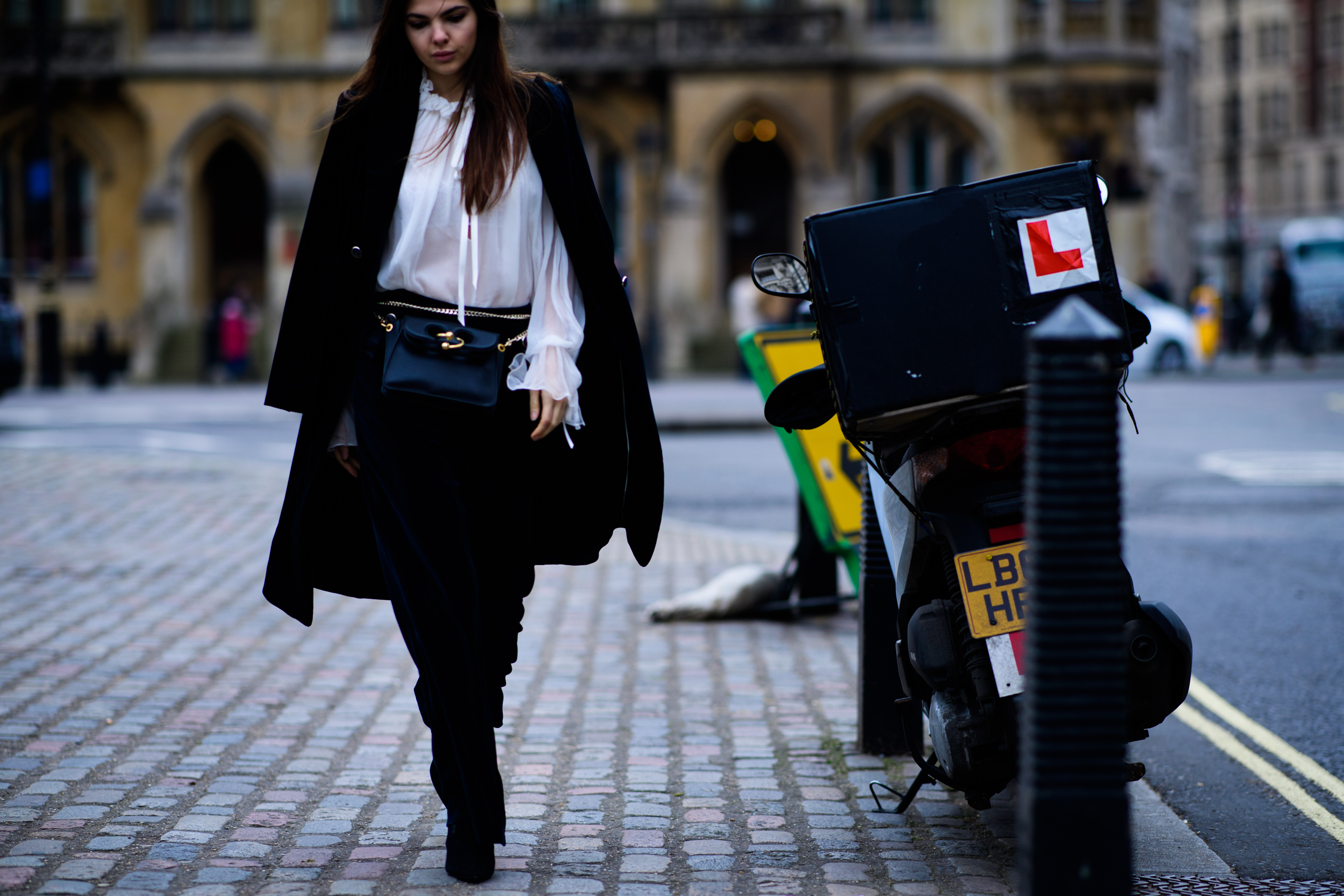 Woman wearing J.W.Anderson bag