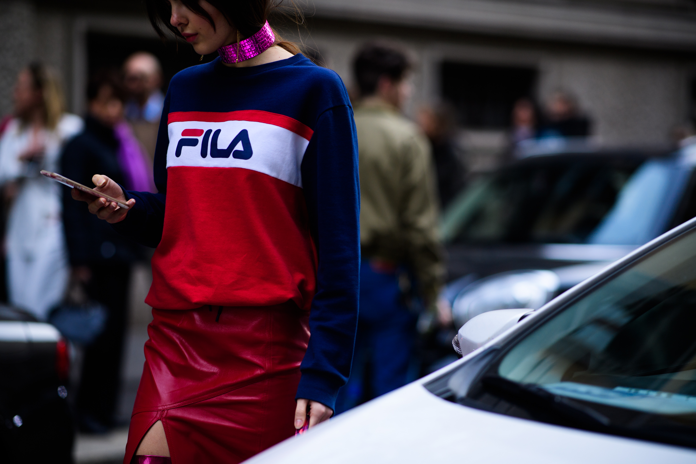 Woman wearing FILA sweater