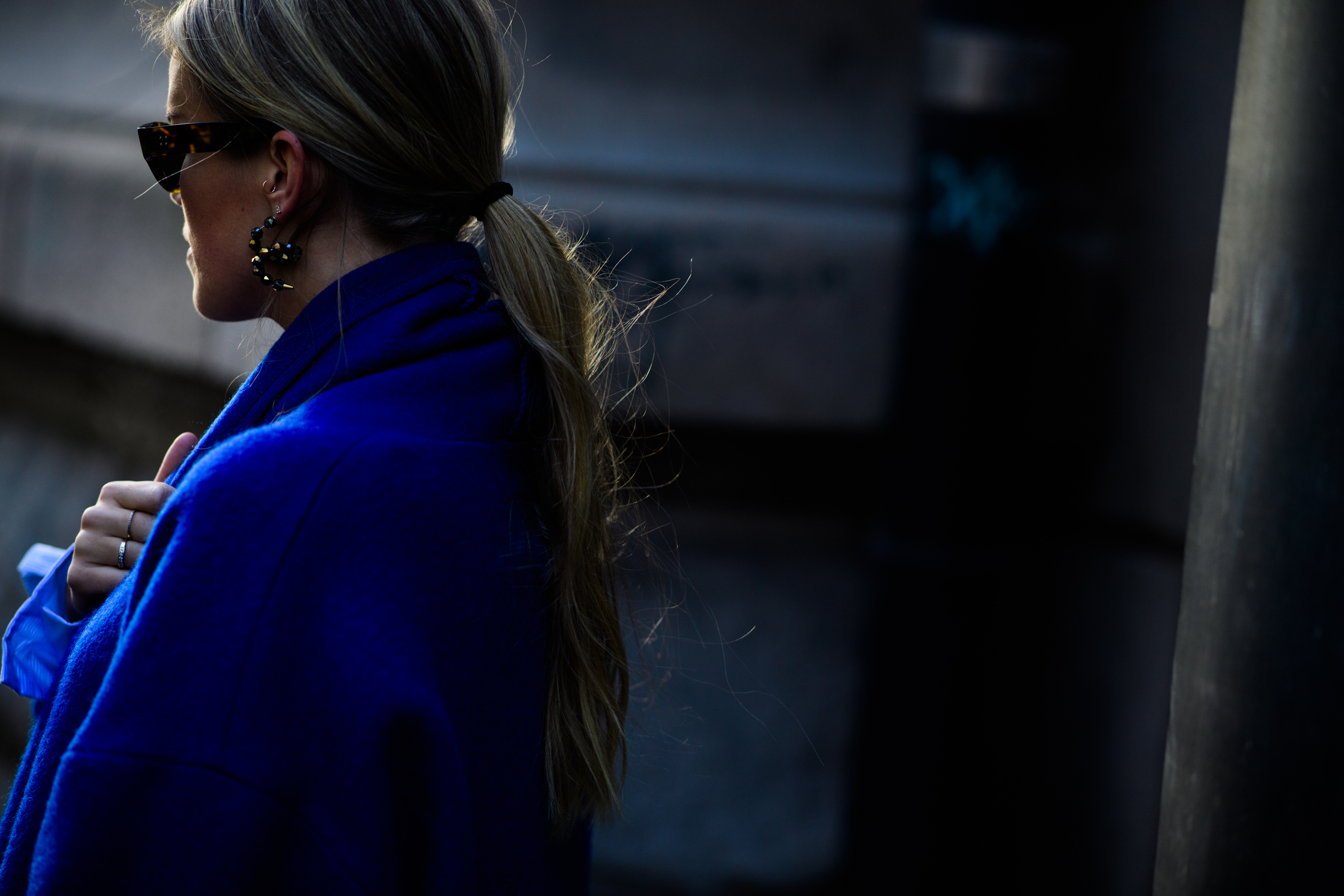 Woman wearing blue coat
