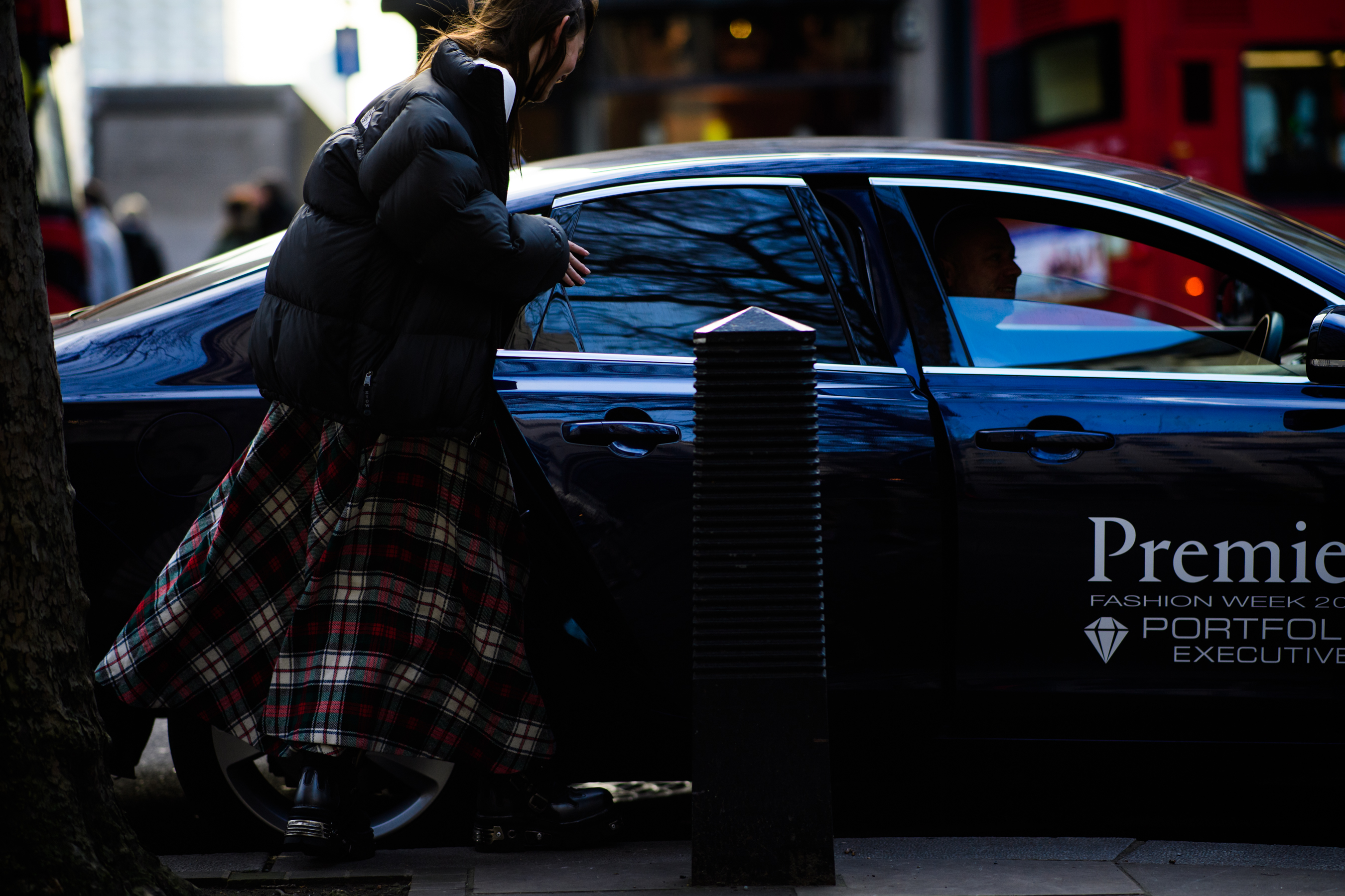 Canadian model wearing tartan skirt