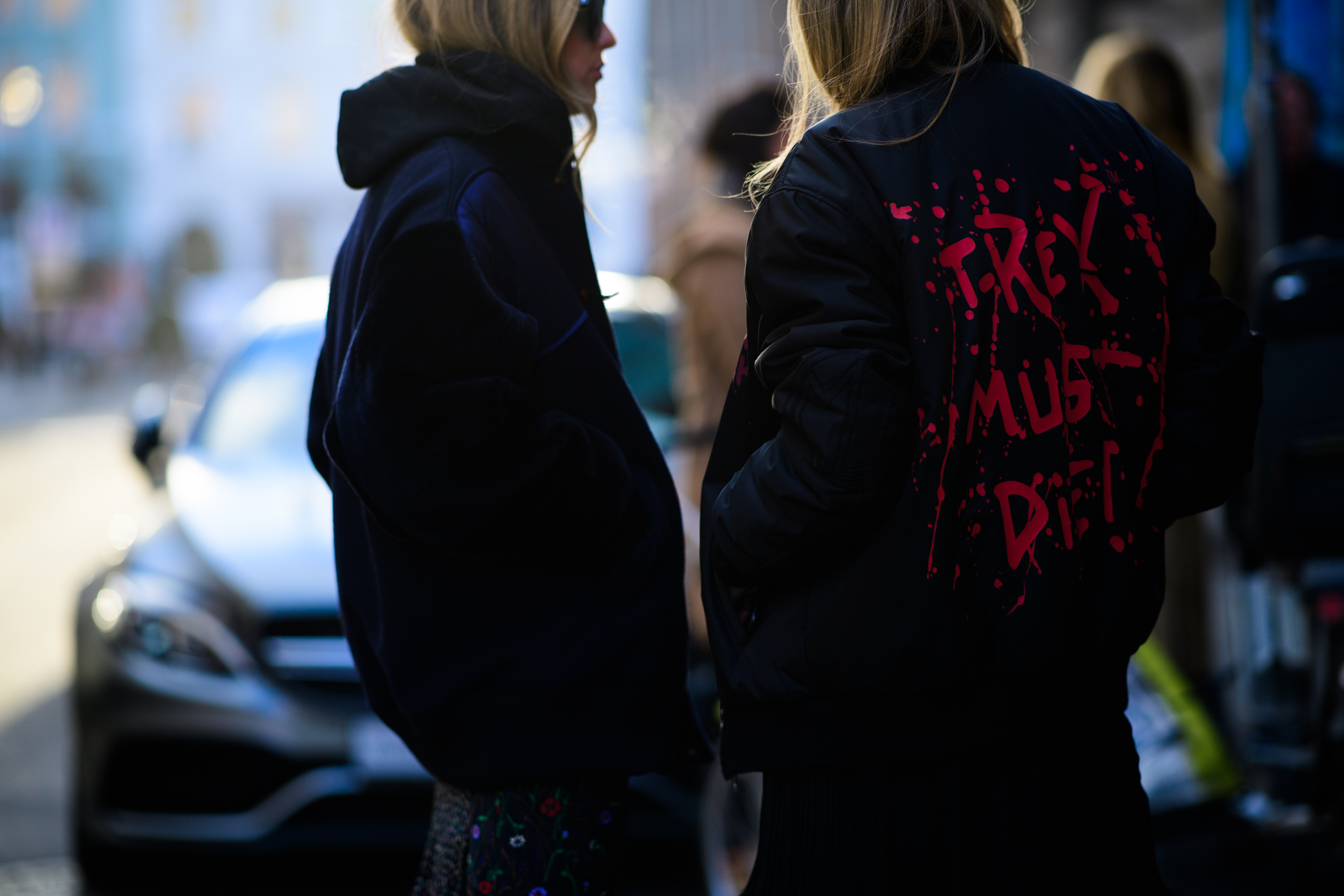Women wearing black jackets