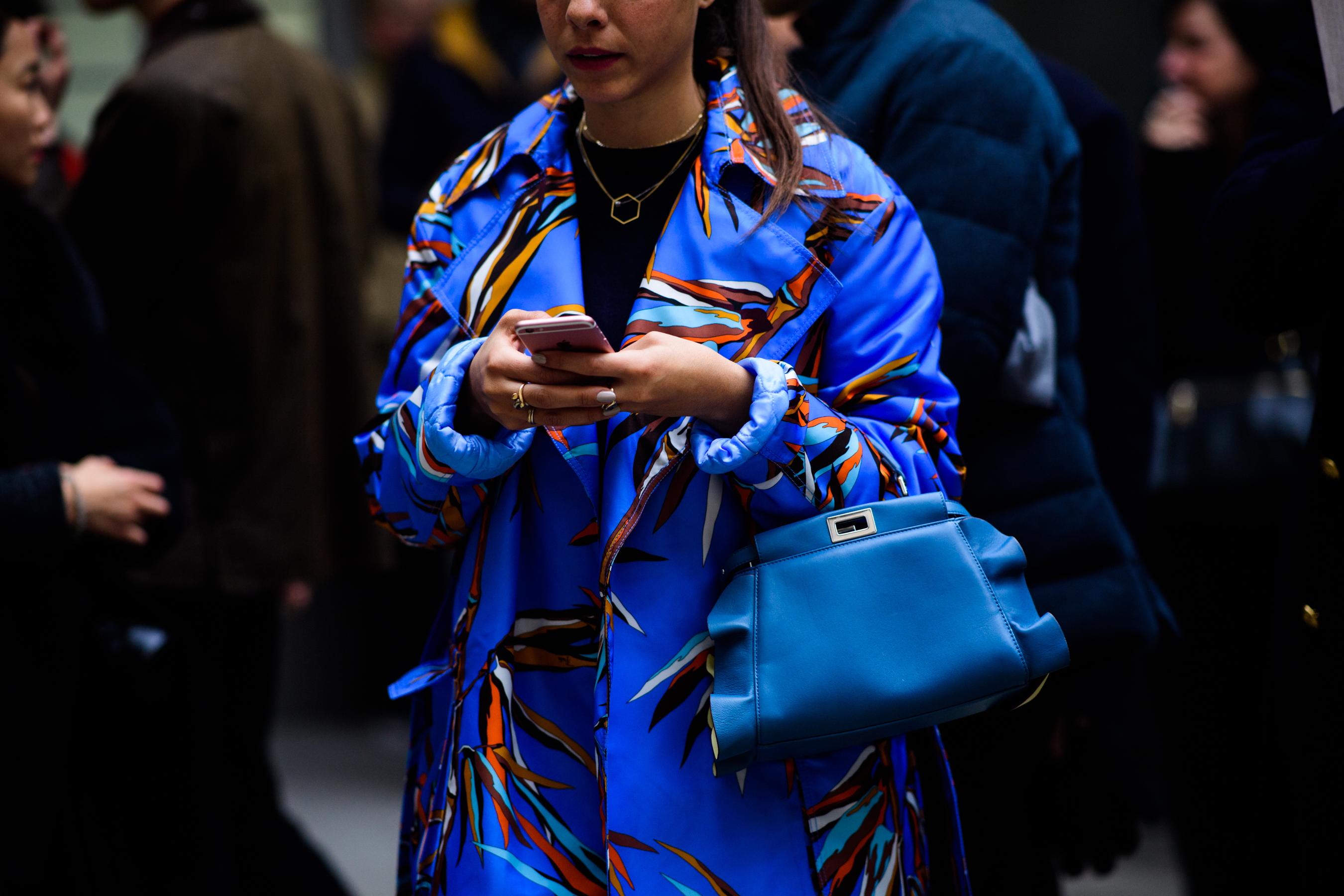 Woman wearing blue fendi bag