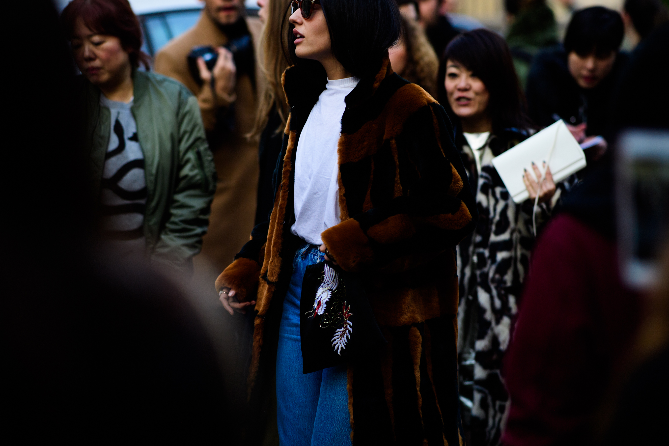 Woman wearing brown fur coat