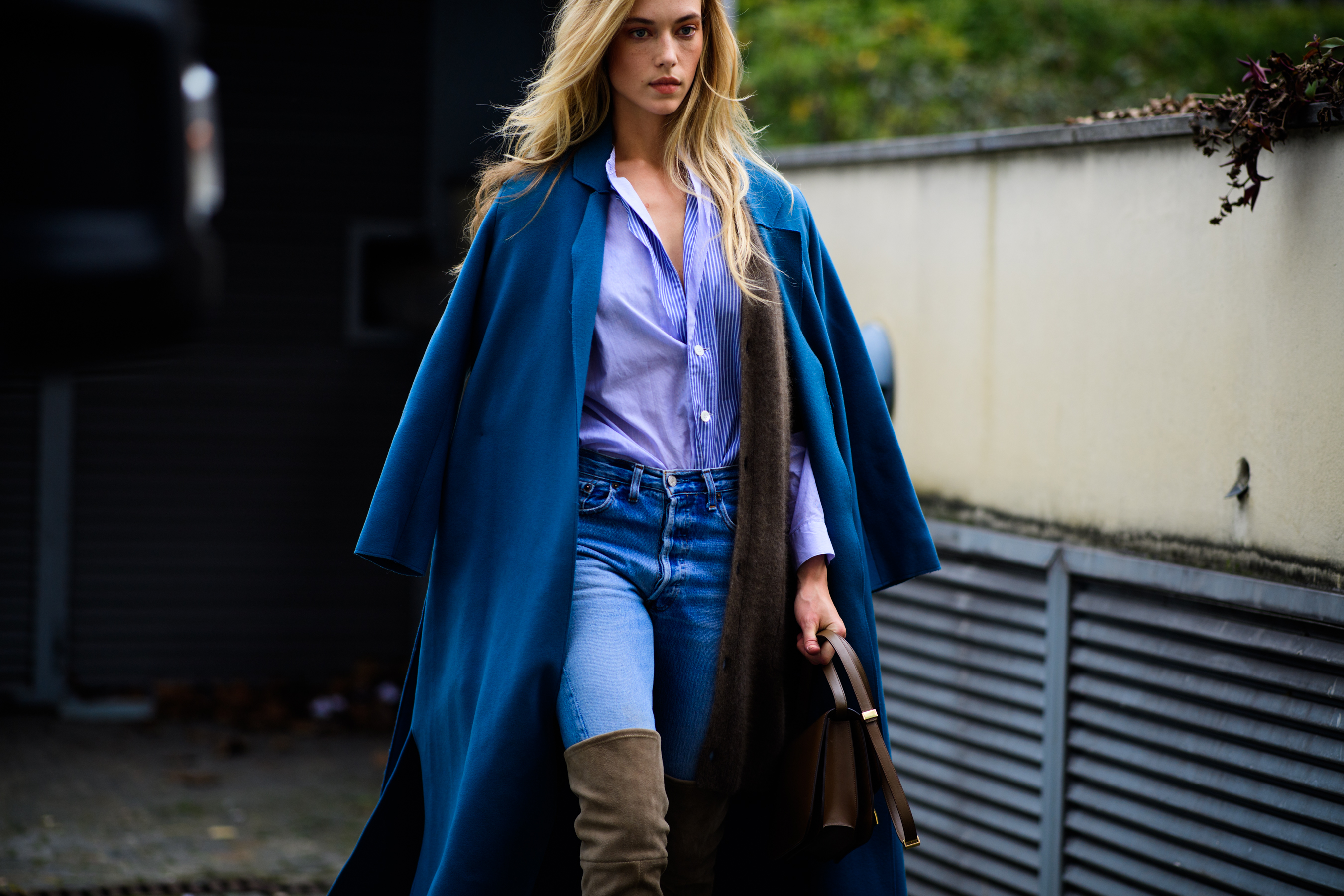Model wearing denim and blue clothes