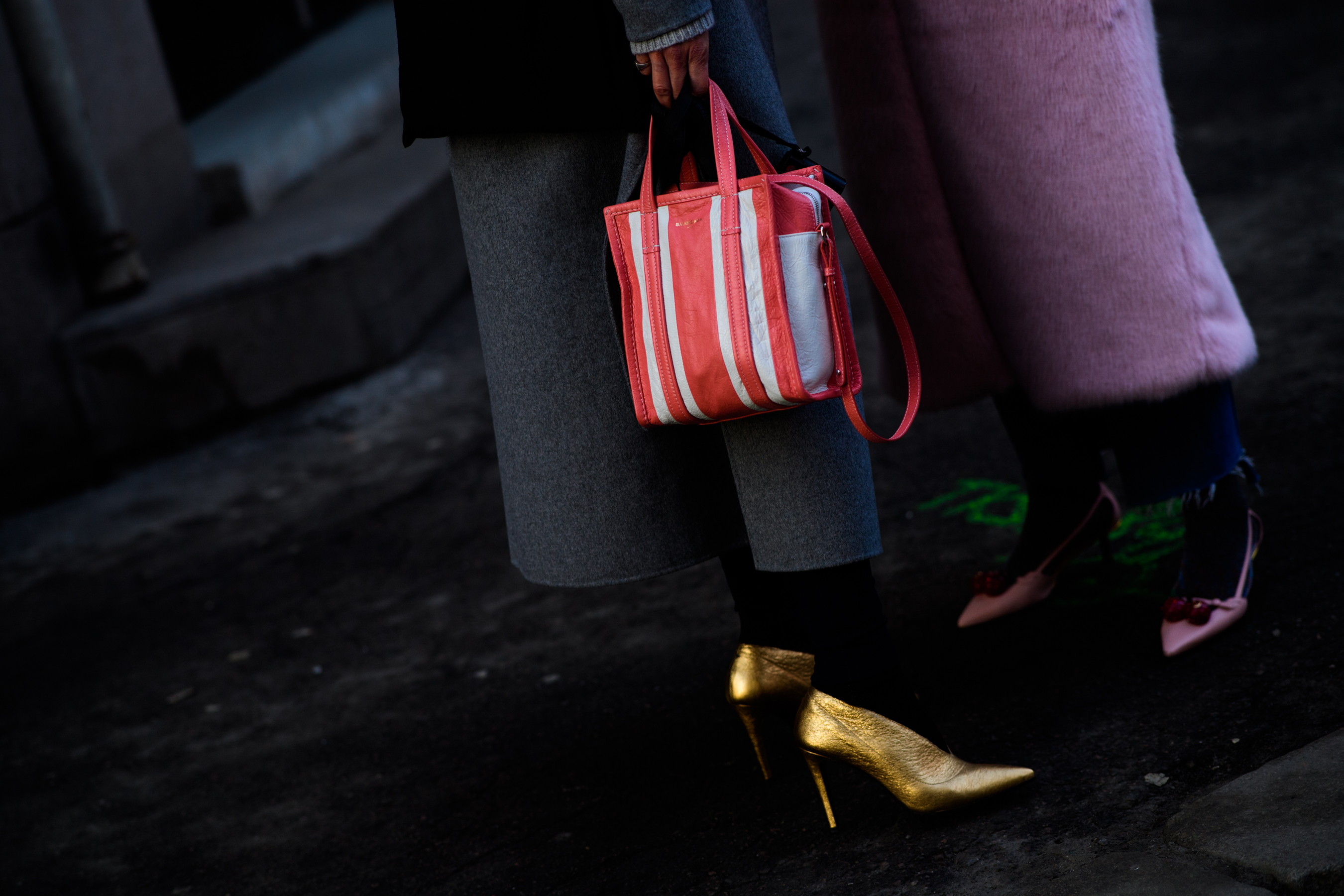 Woman wearing golden shoes