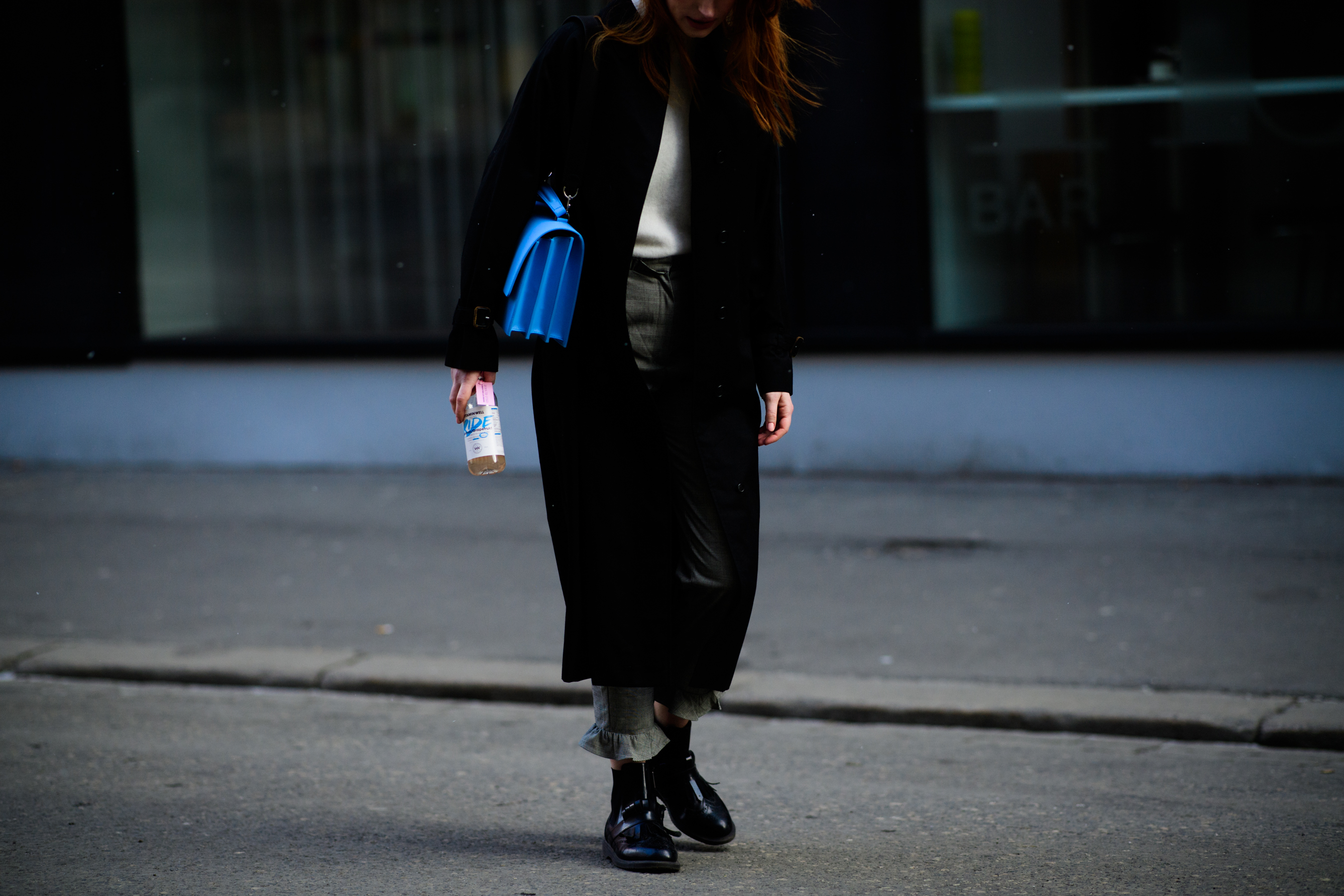 Woman wearing black coat