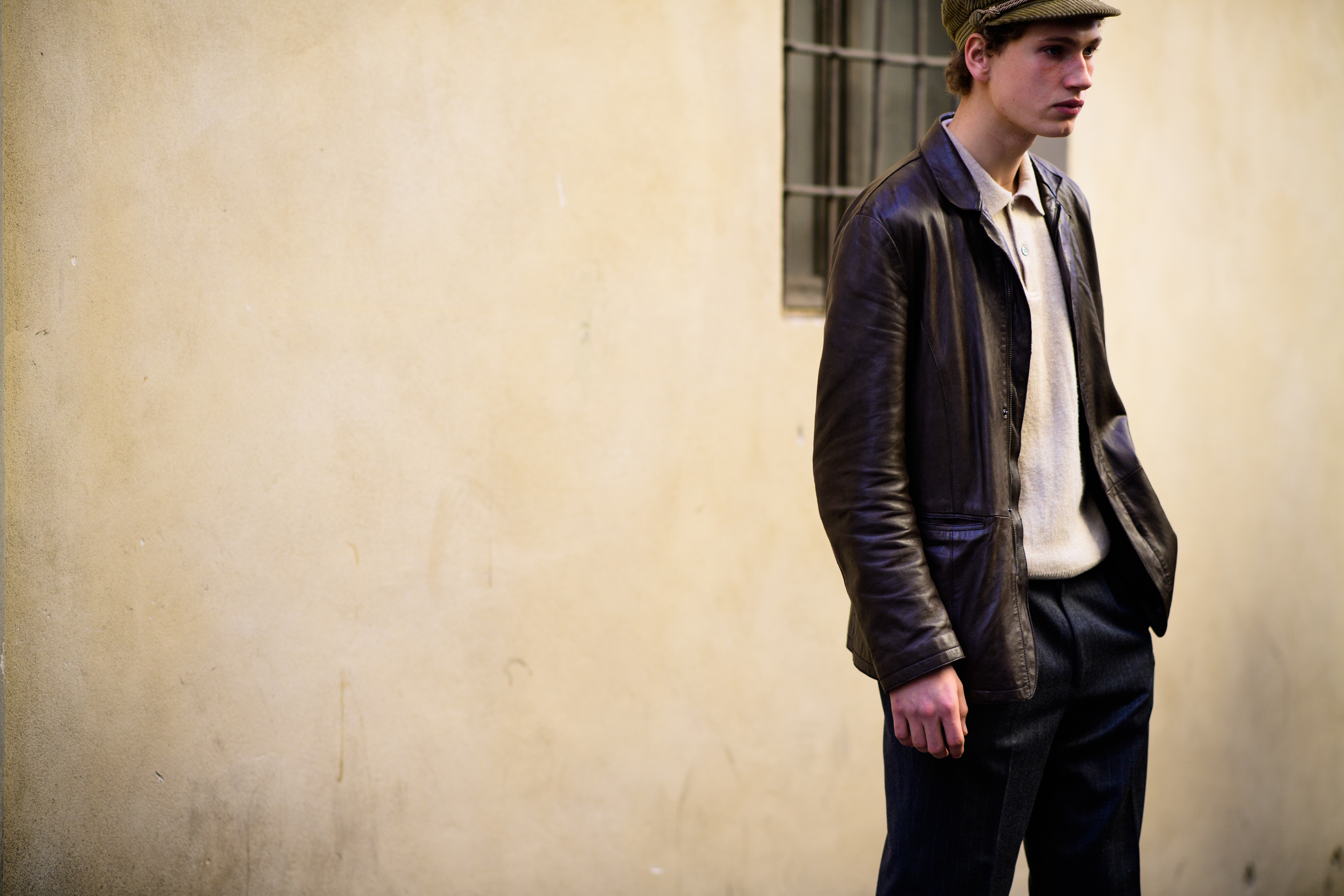 Model wearing brown jacket