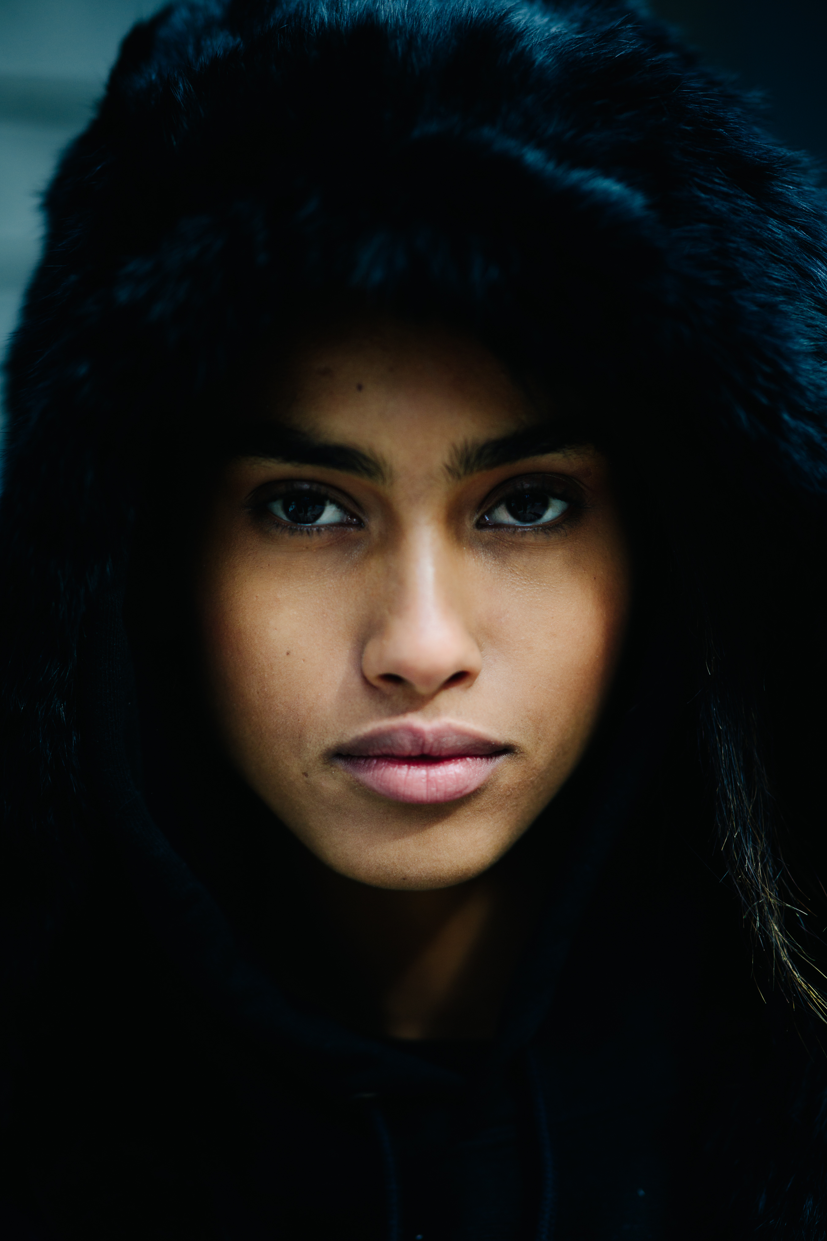 Portrait of a model in black hood