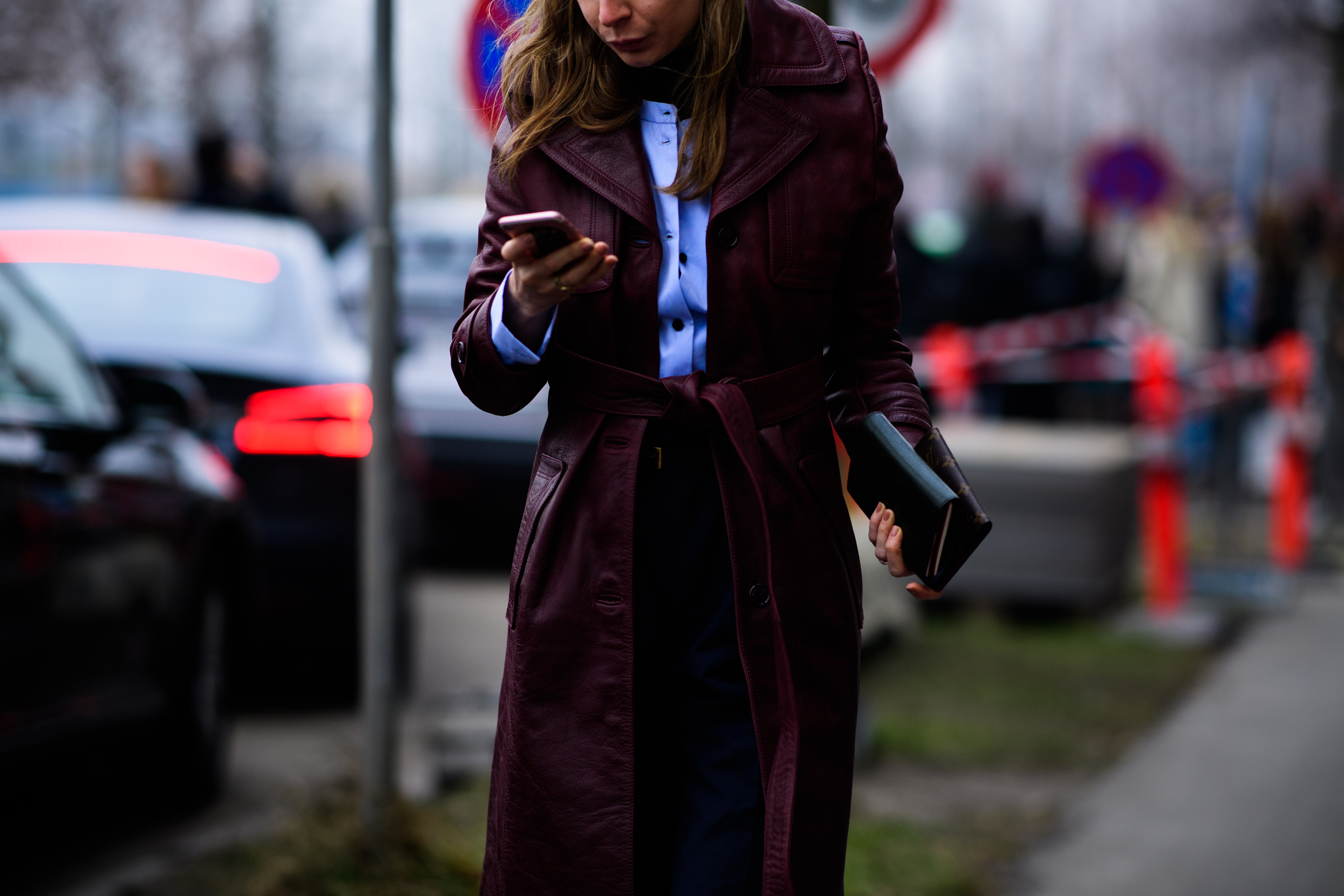 Woman wearing red leather cloak
