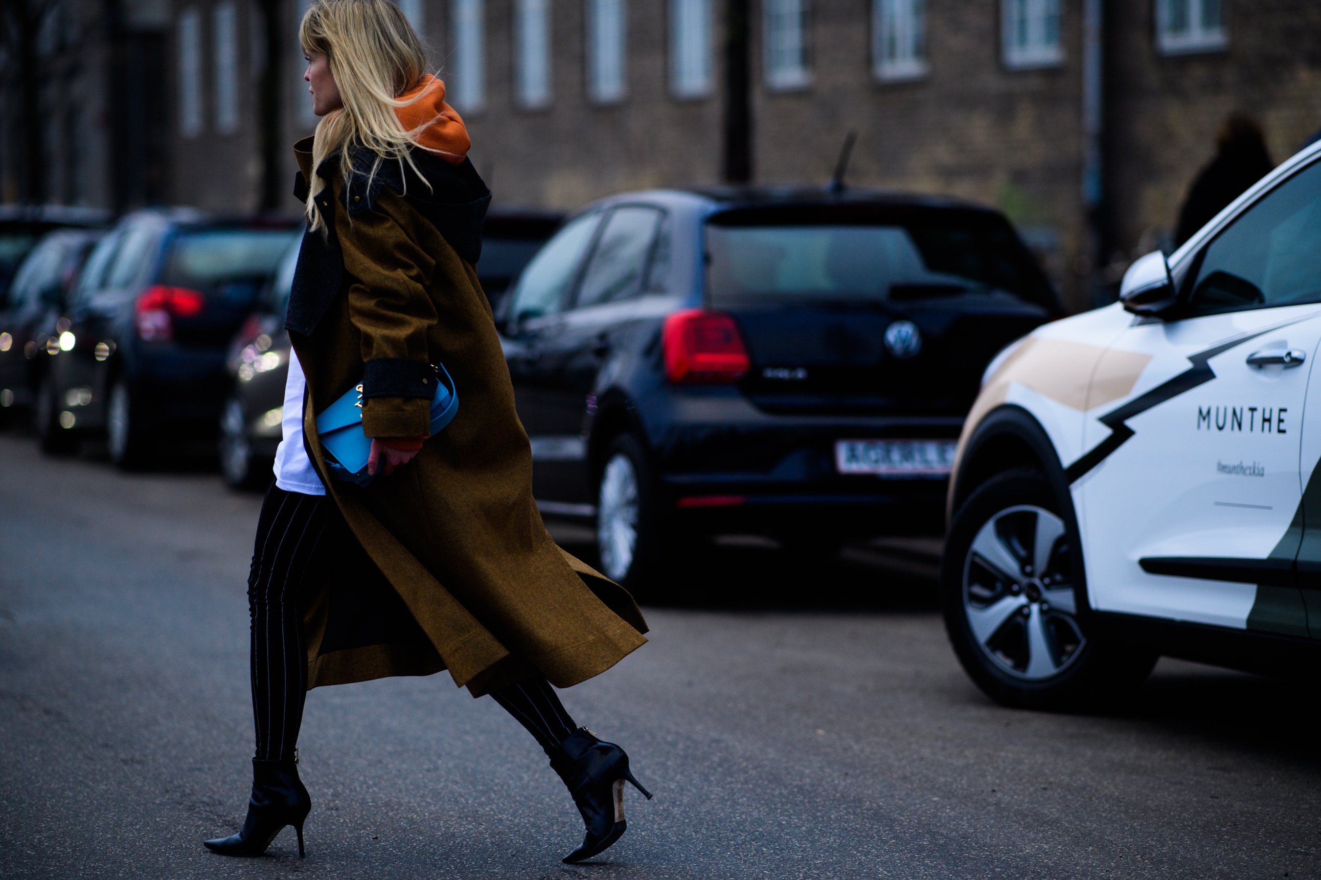 Woman wearing brown coat