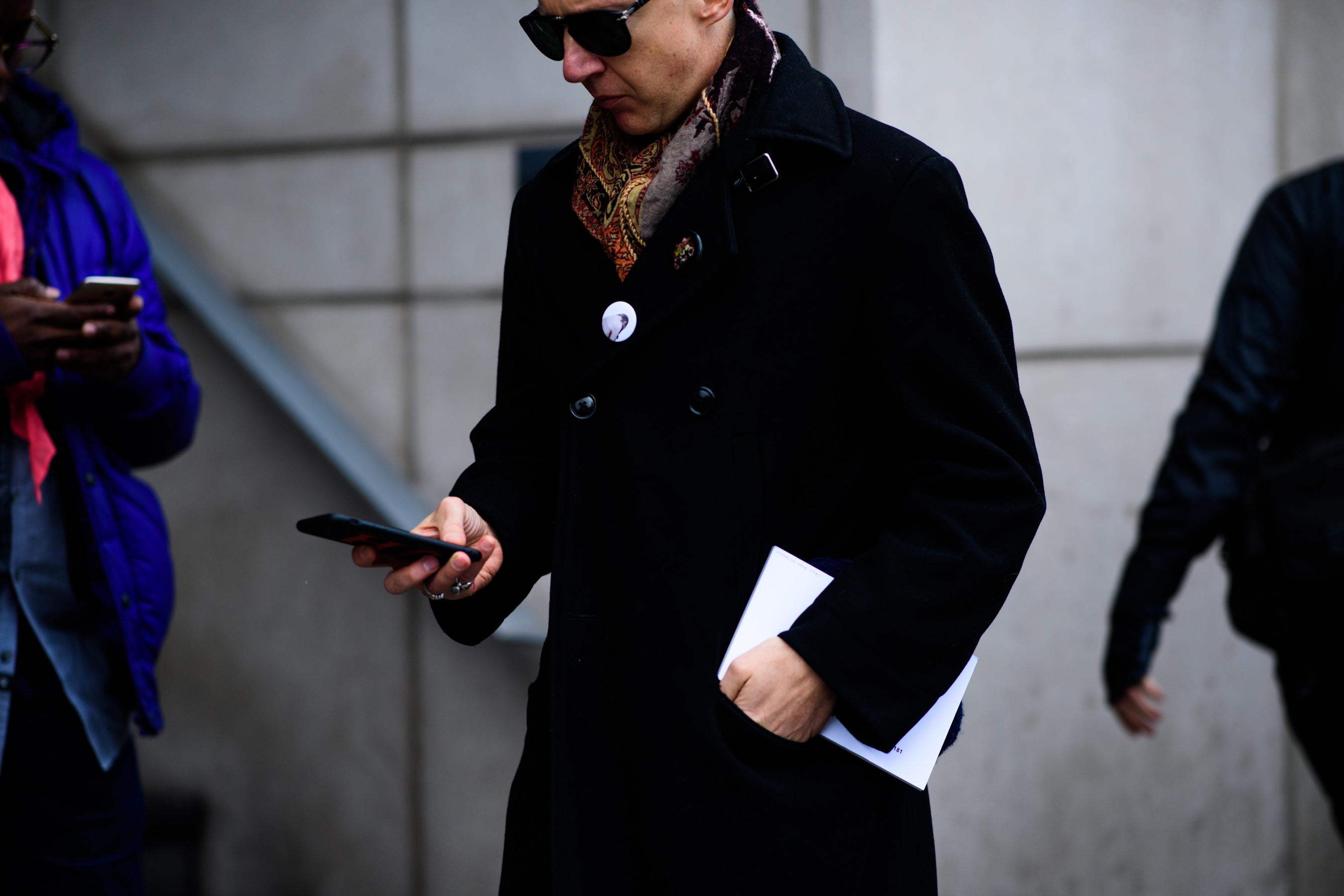 Man wearing scarf and glasses