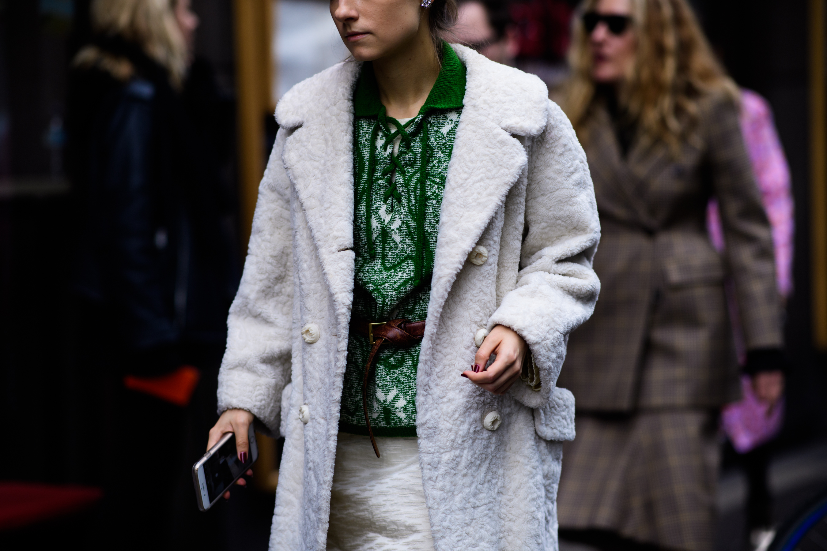 Woman wearing white coat