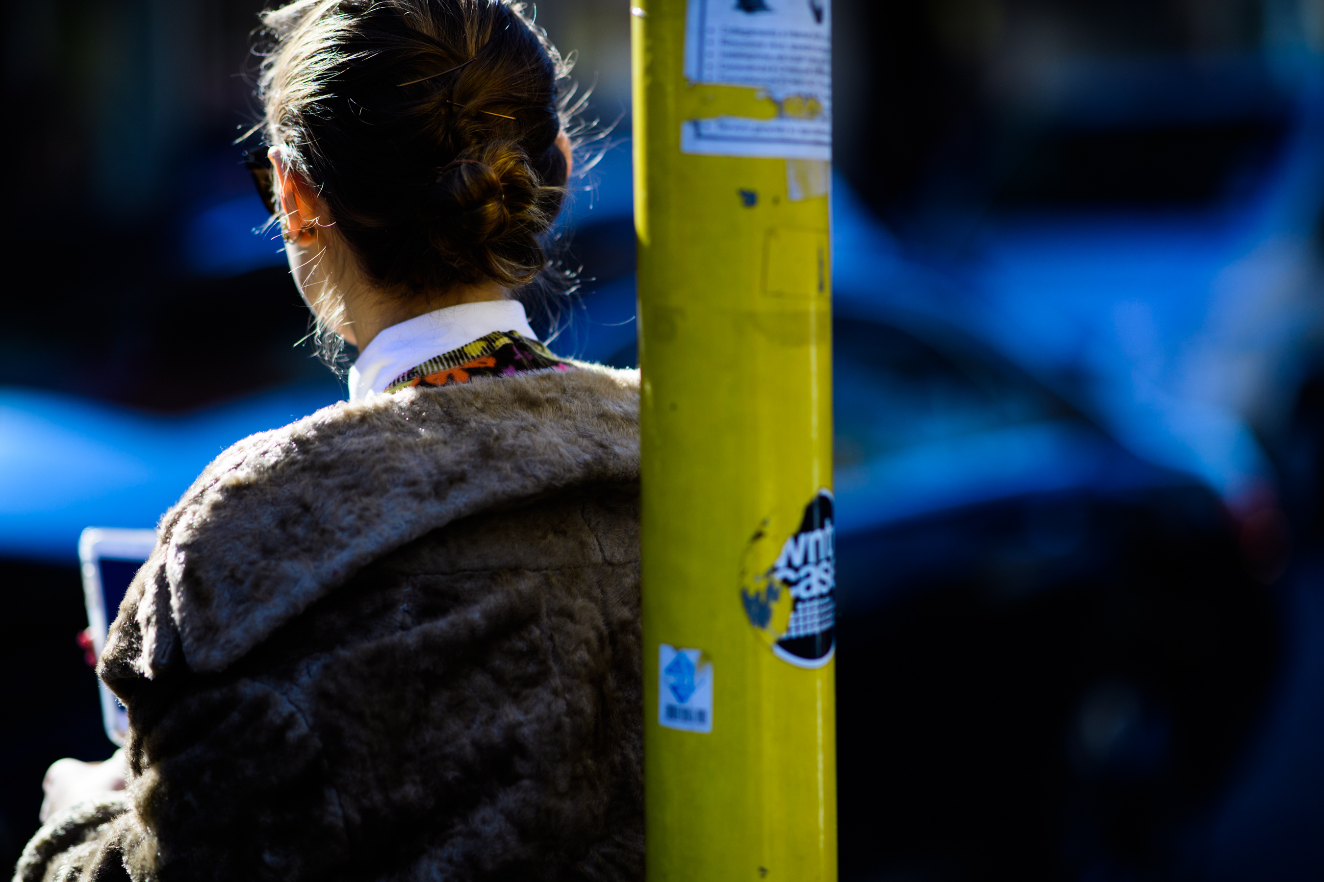Woman wearing brown coat