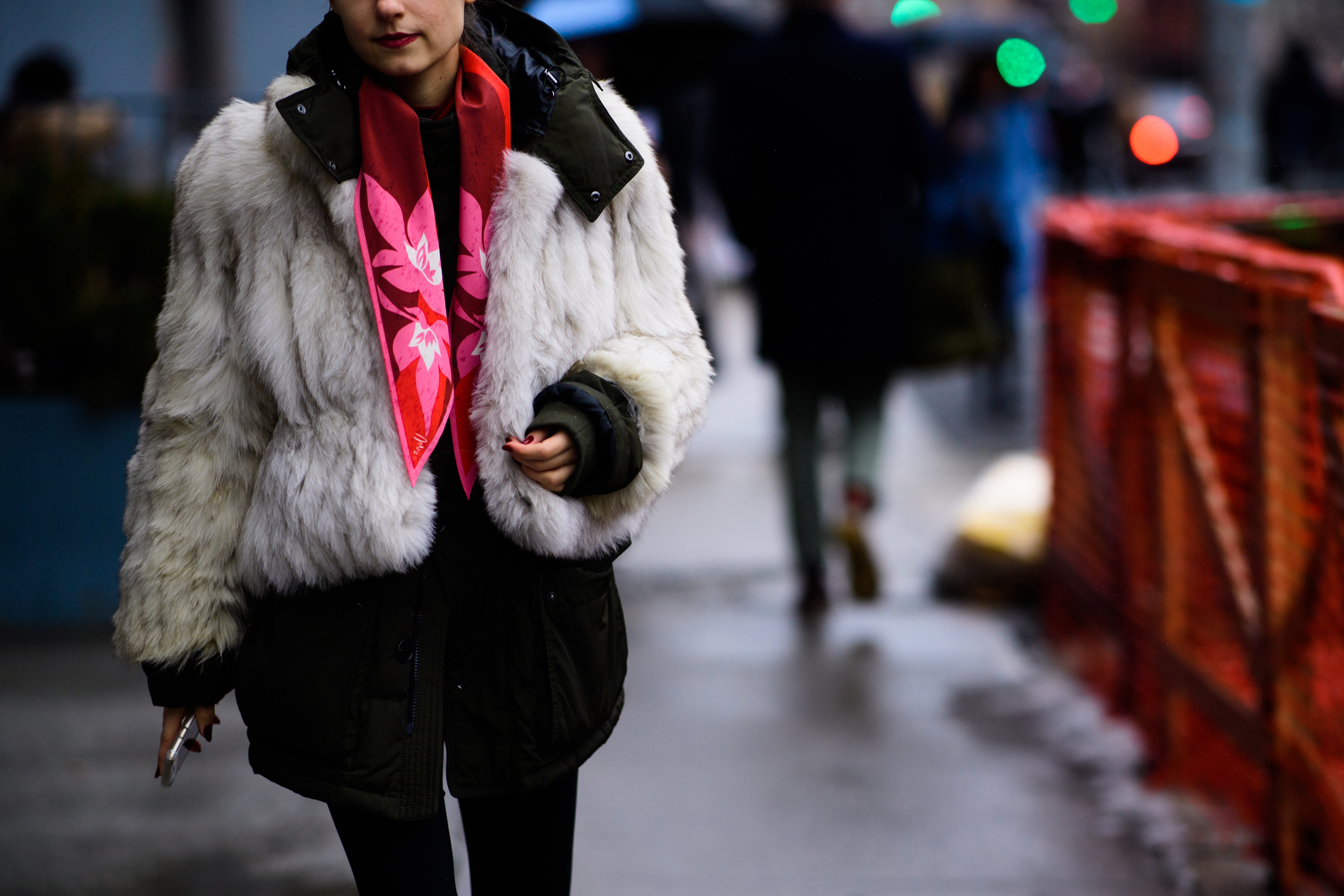 American illustrator wearing fur detail parka