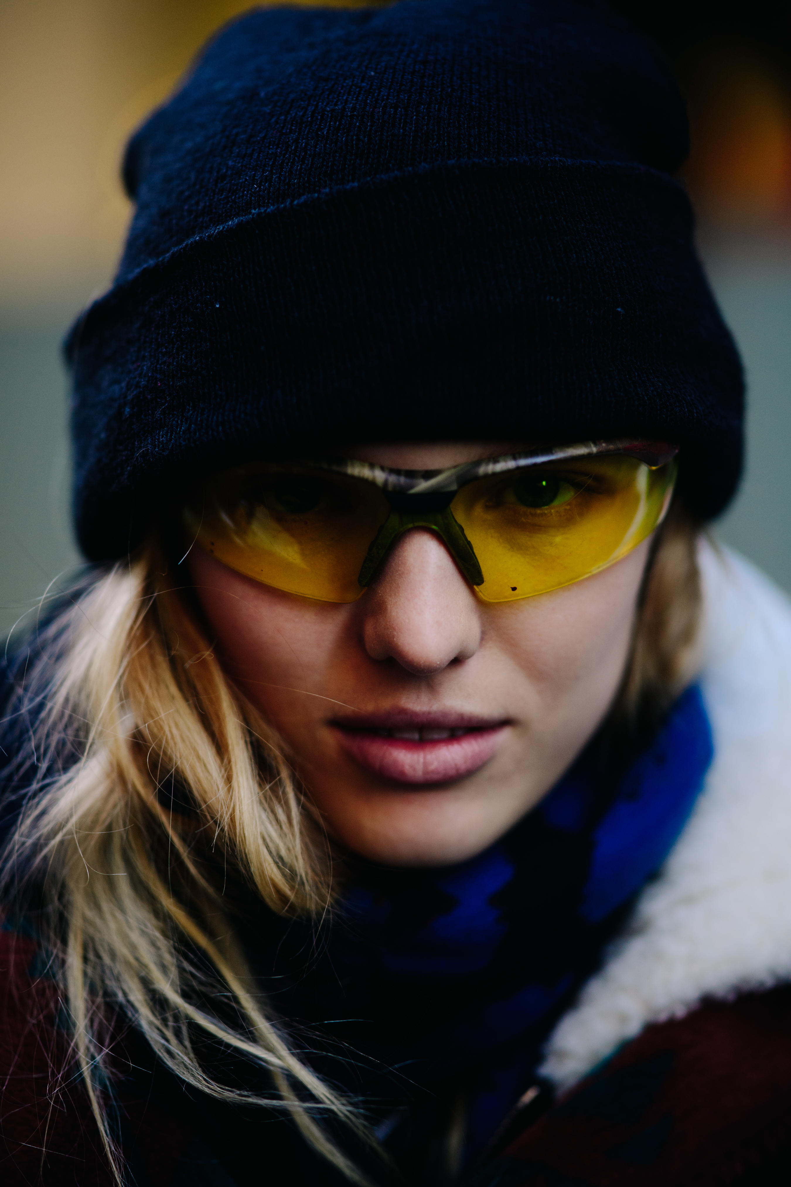 Woman wearing yellow sunglasses