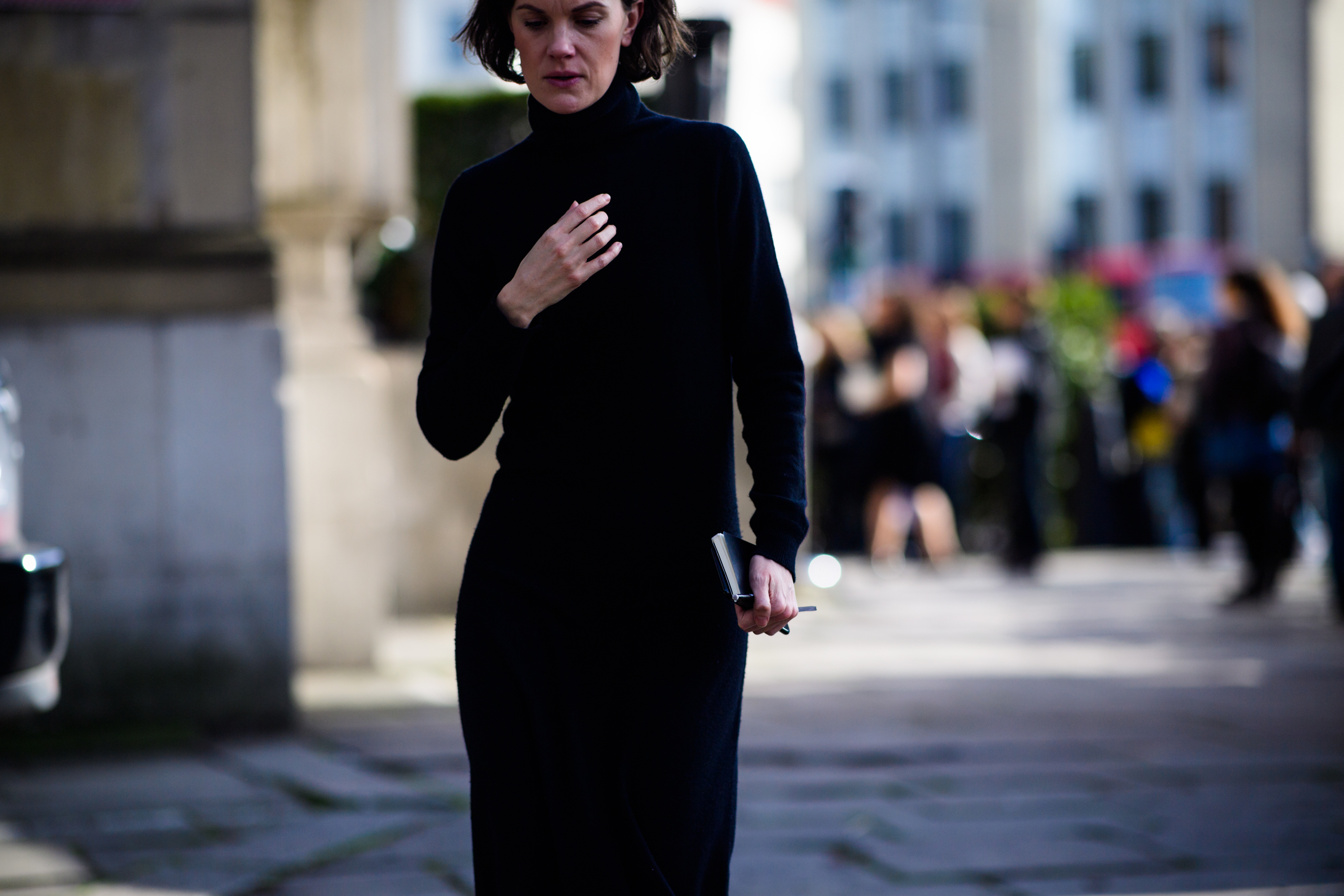 British journalist wearing black dress