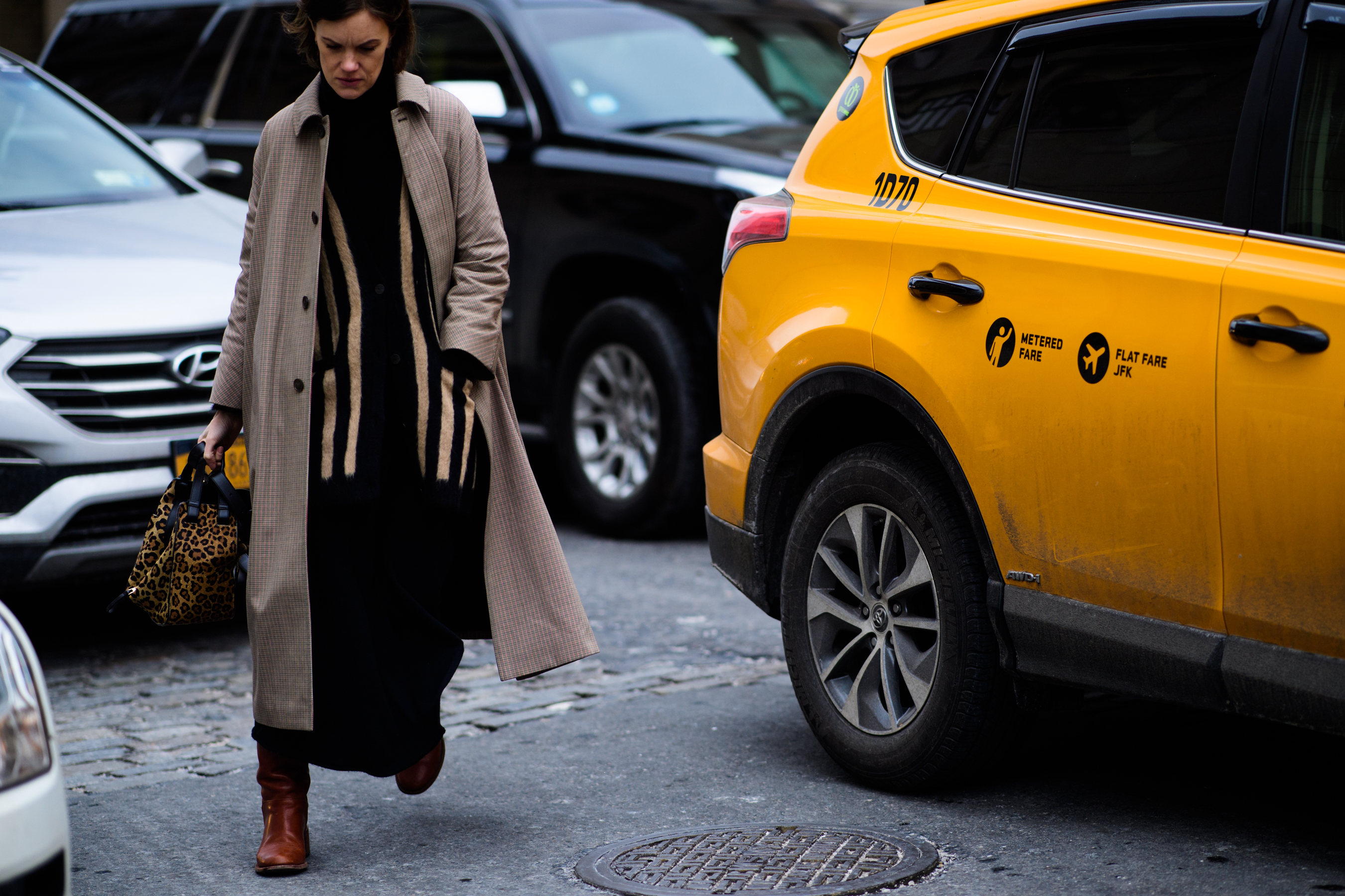 FT editor wearing long beige coat