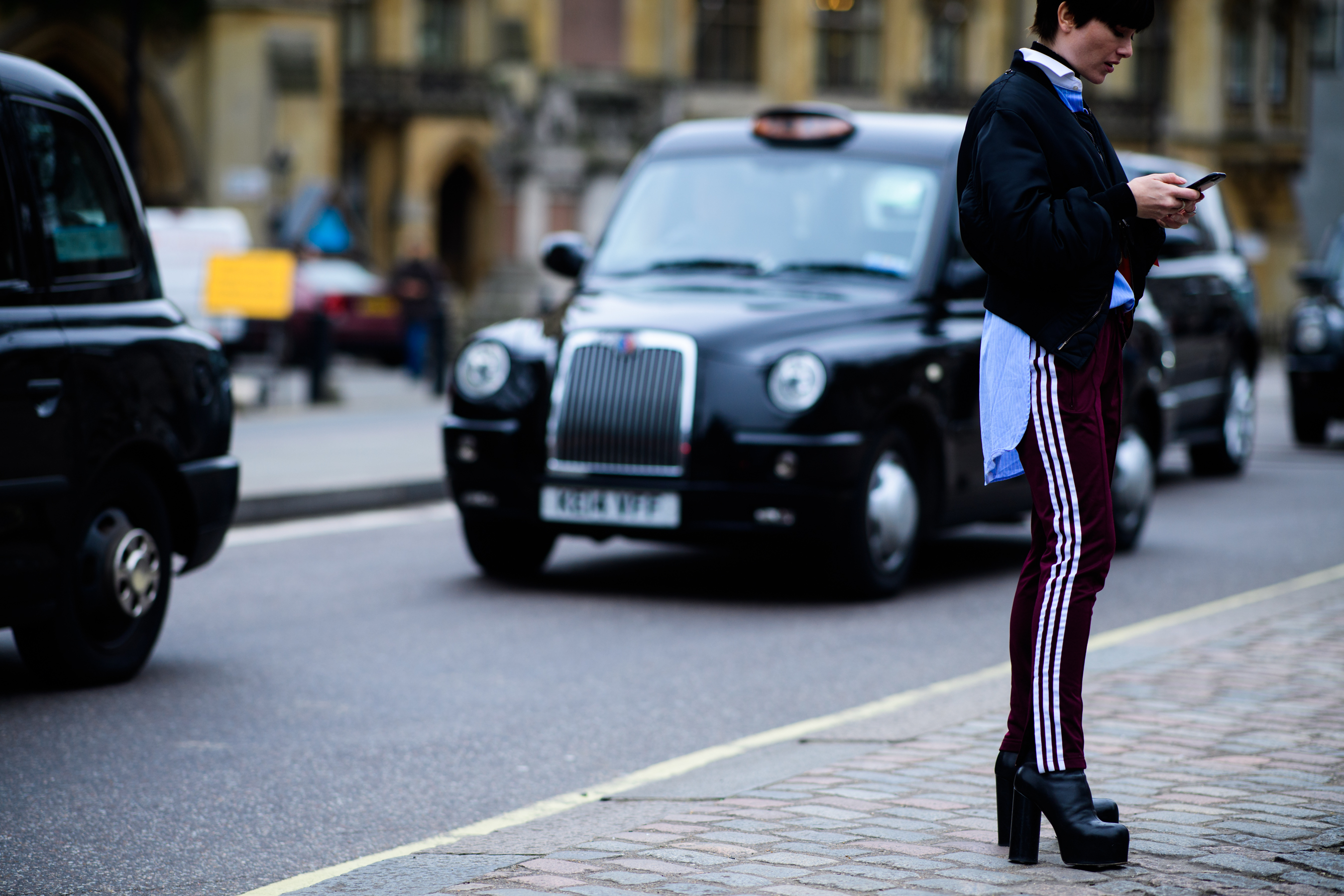 Editor of British Vogue wearing Adidas pants