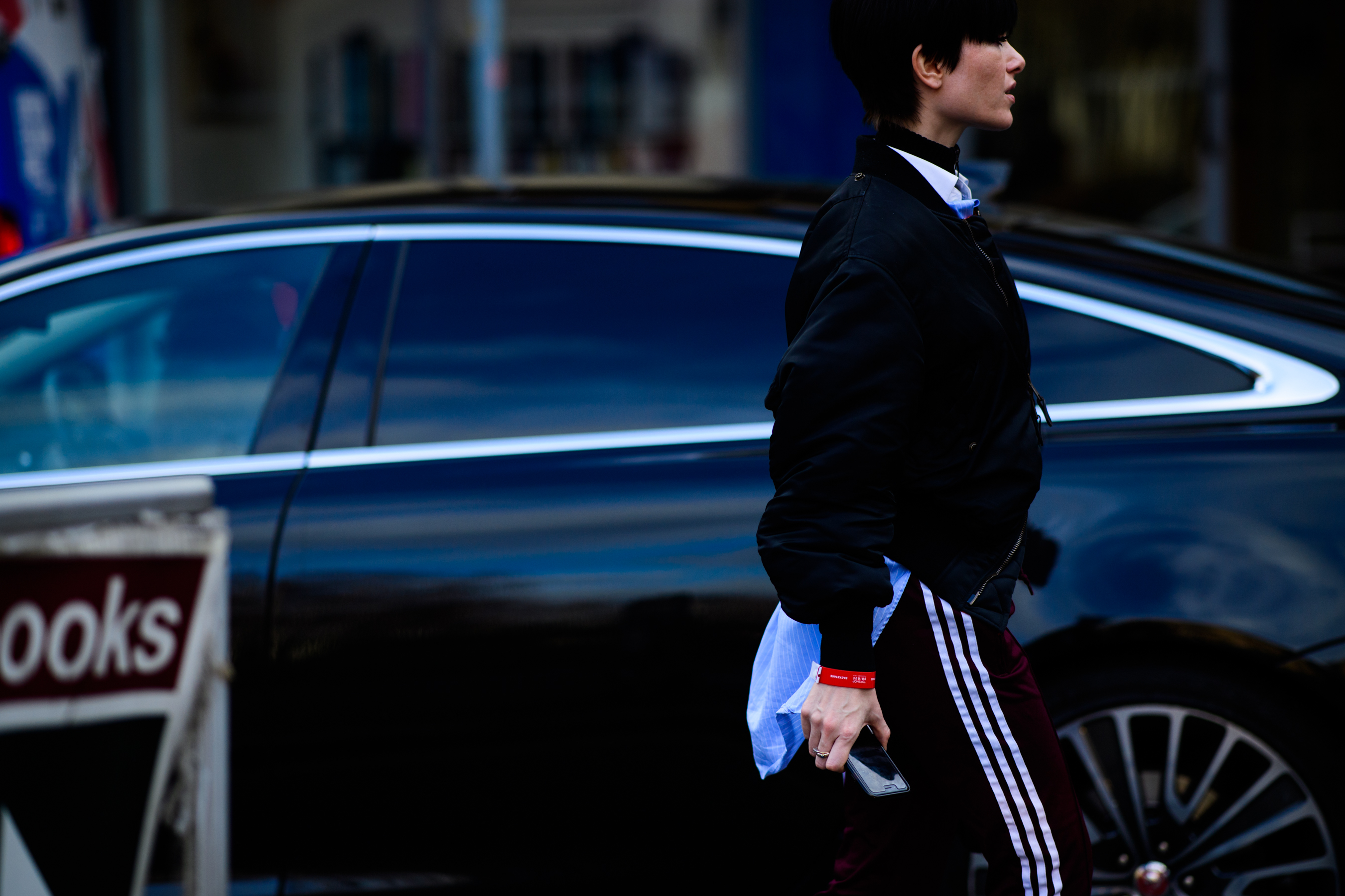 Editor of British Vogue wearing Adidas pants