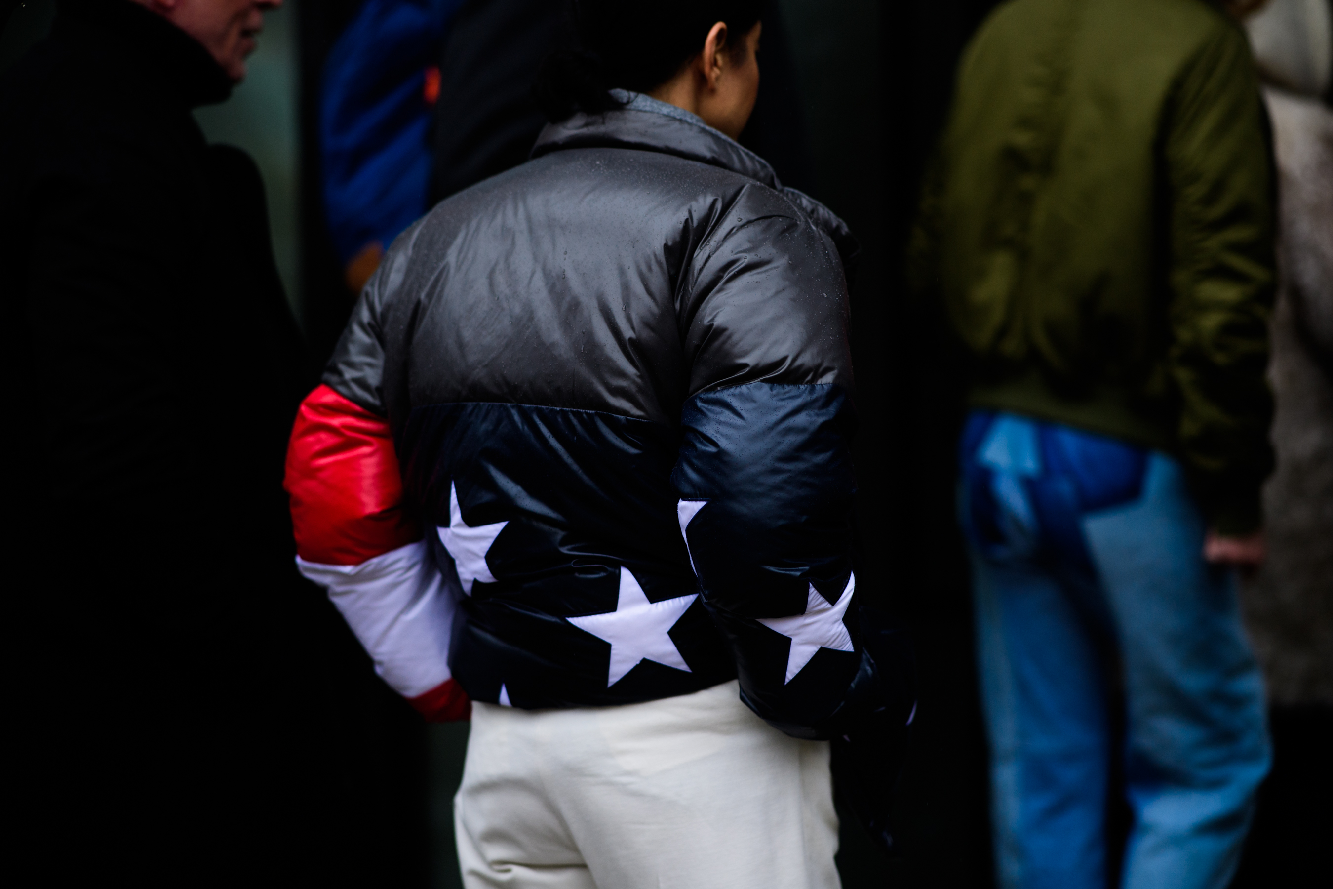 Woman wearing puffer jacket with stars