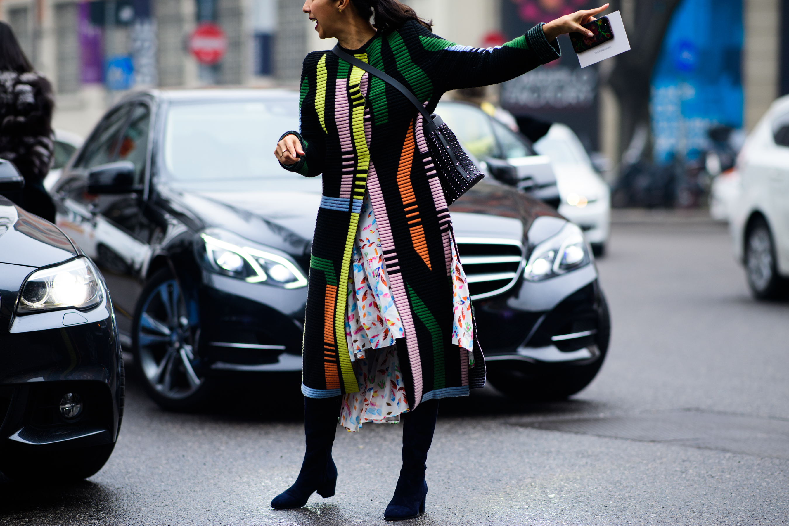 Woman wearing colorful coat