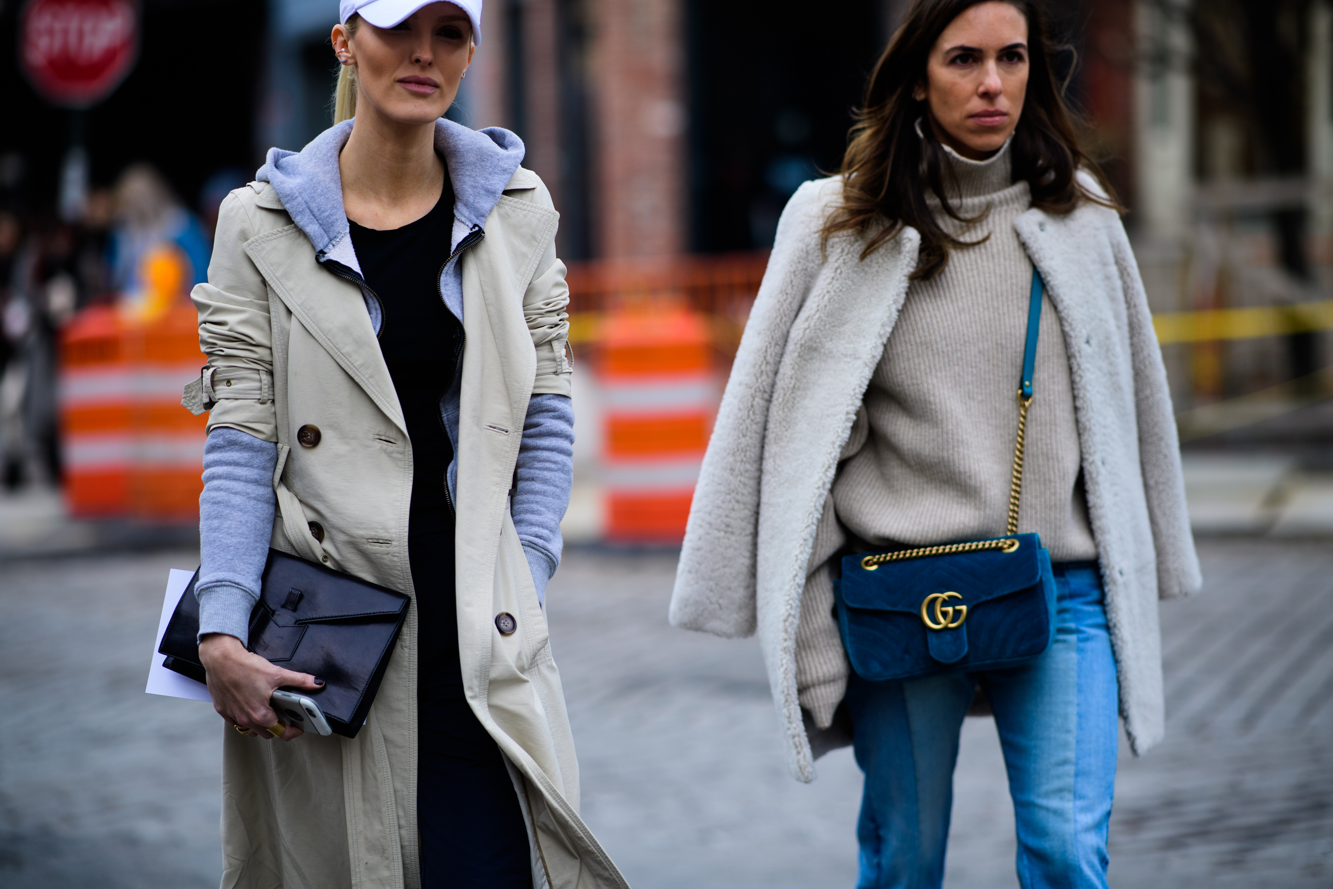 Two women wearing beige outfits