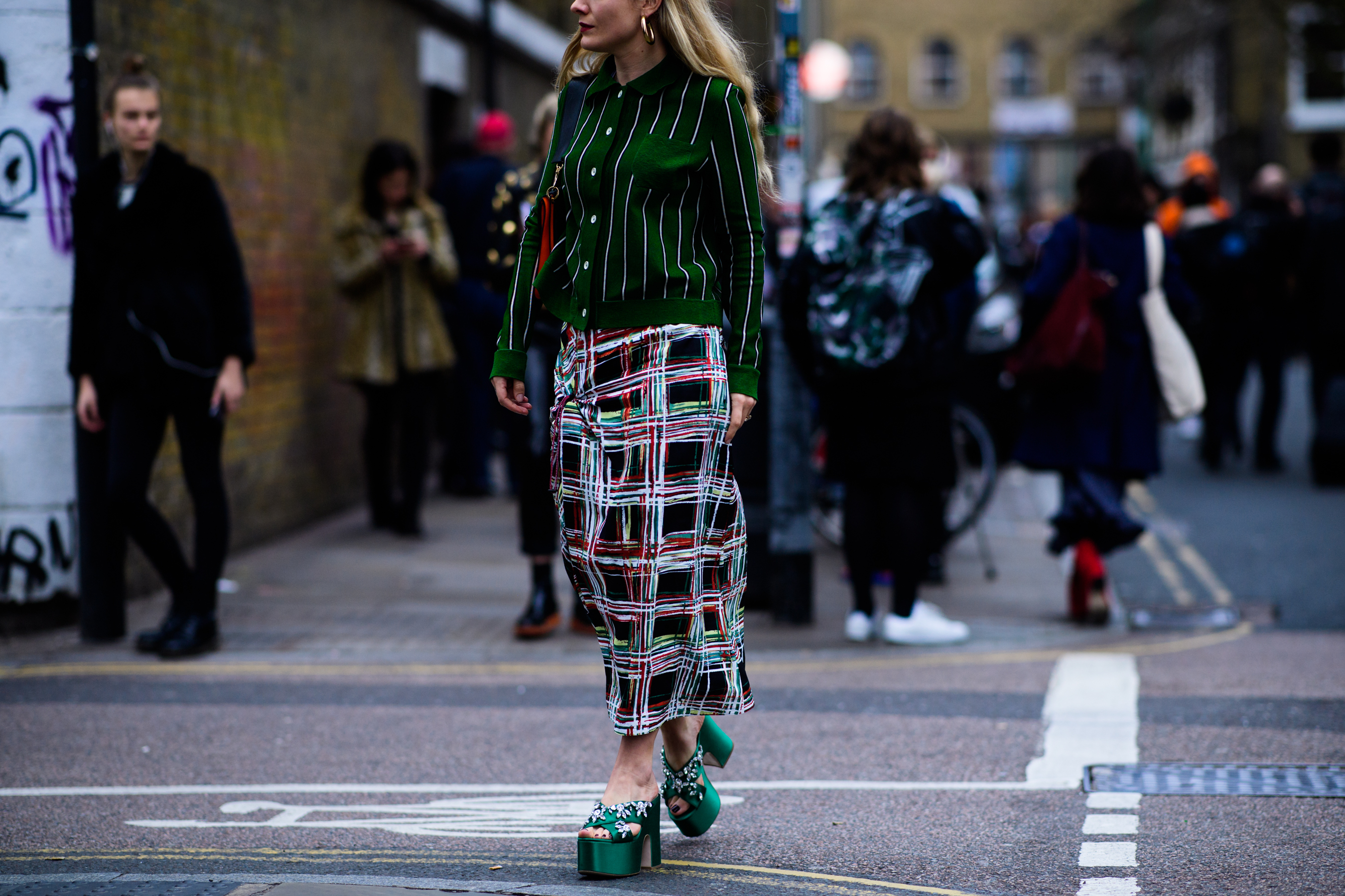 British woman wearing green shoes