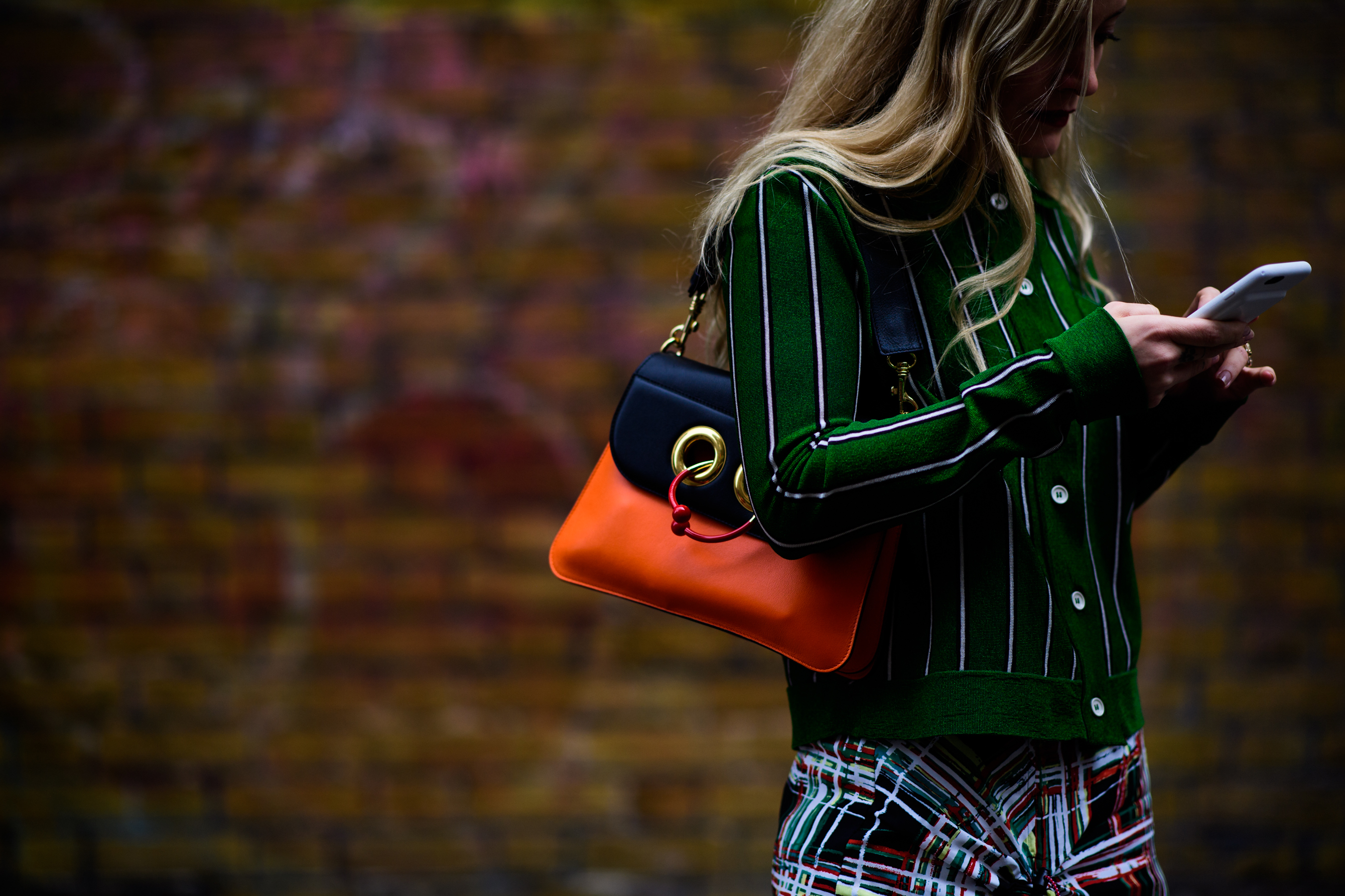 British woman with J.W.Anderson piercing bag