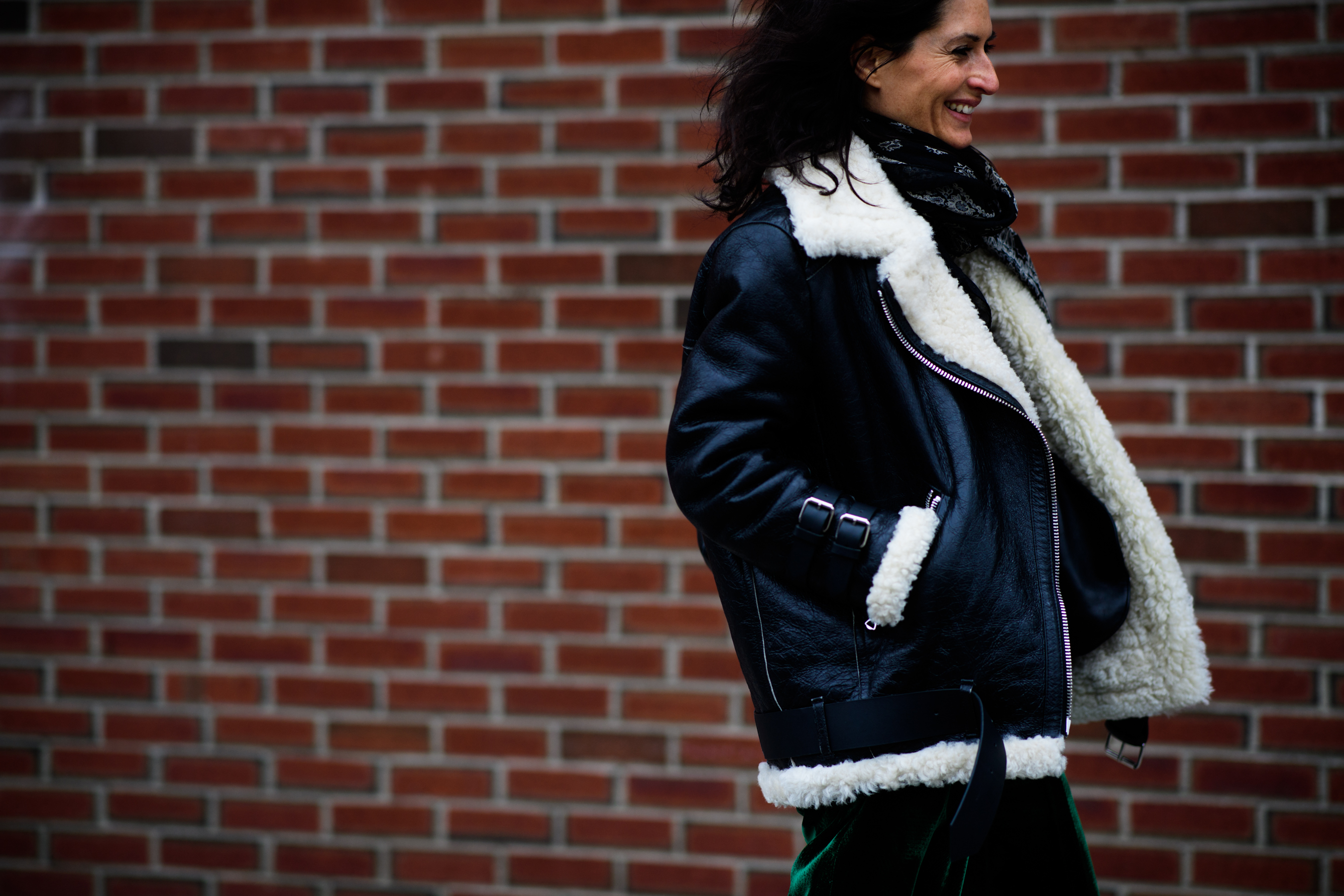 Woman wearing sheepskin jacket