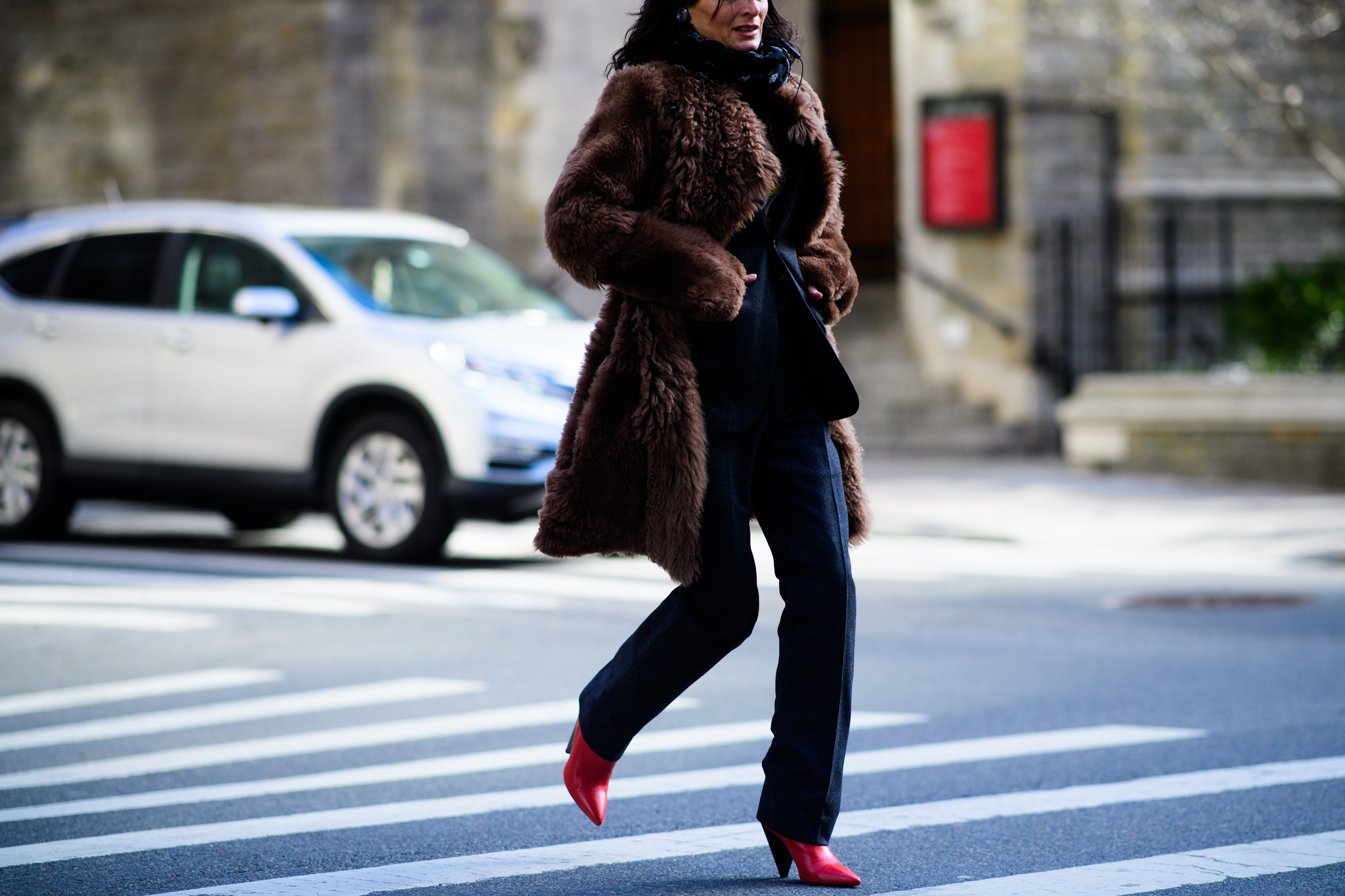 Woman wearing brown fur coat