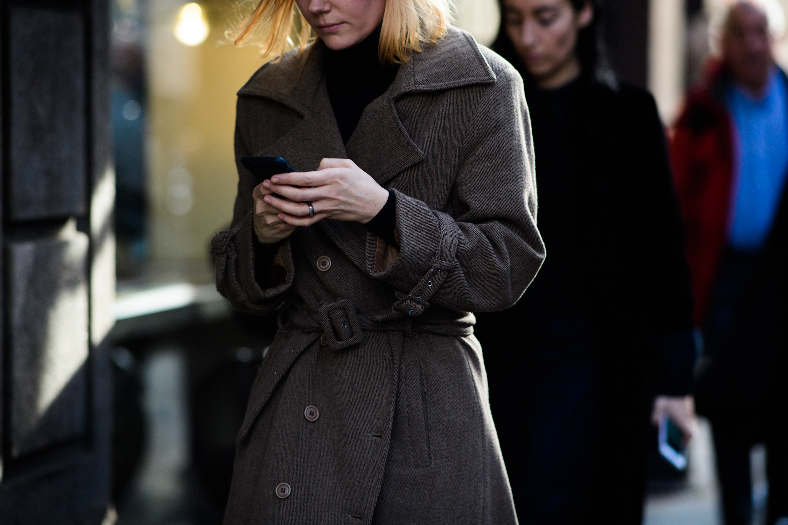 Woman wearing brown cloack