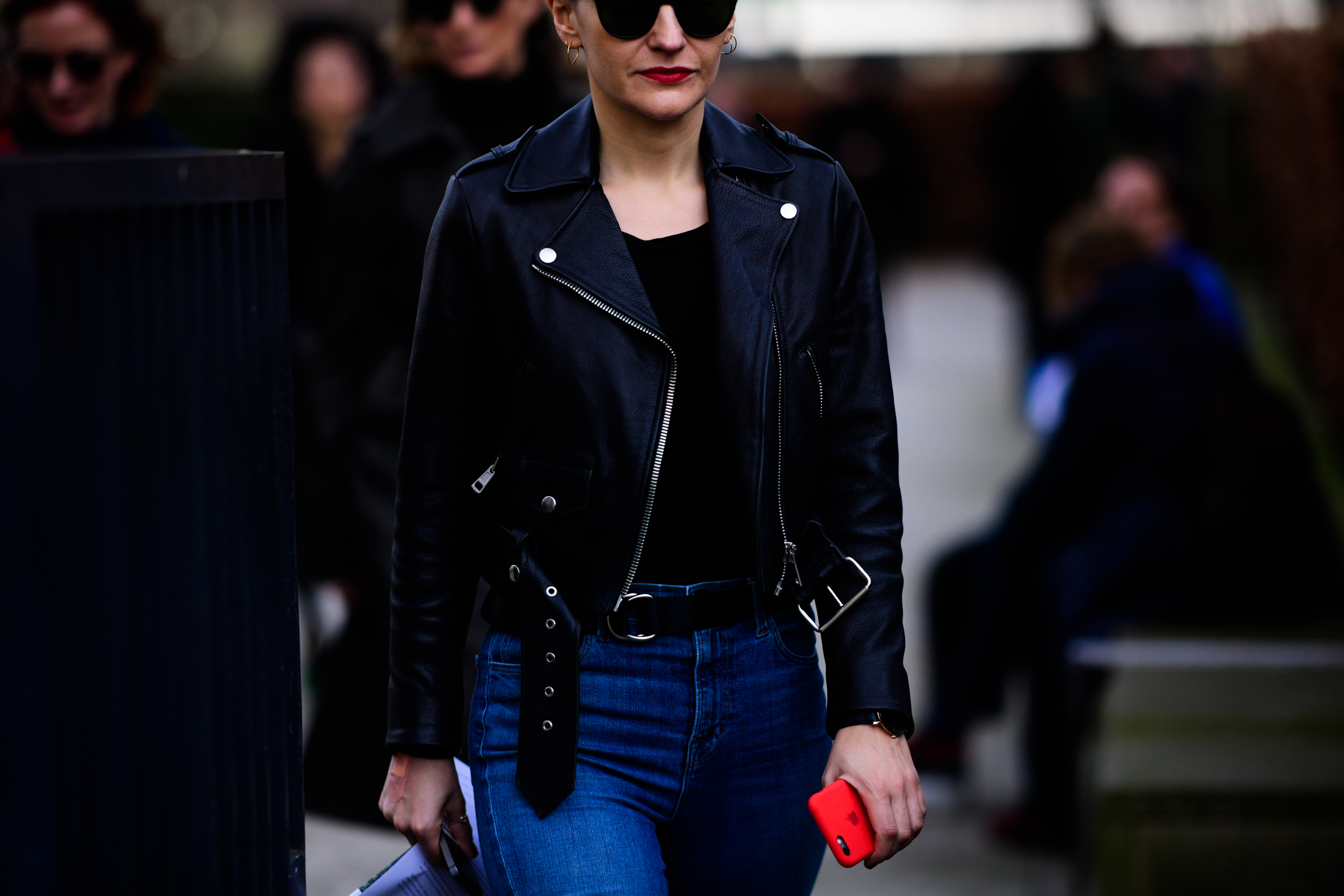 Woman wearing short leather jacket