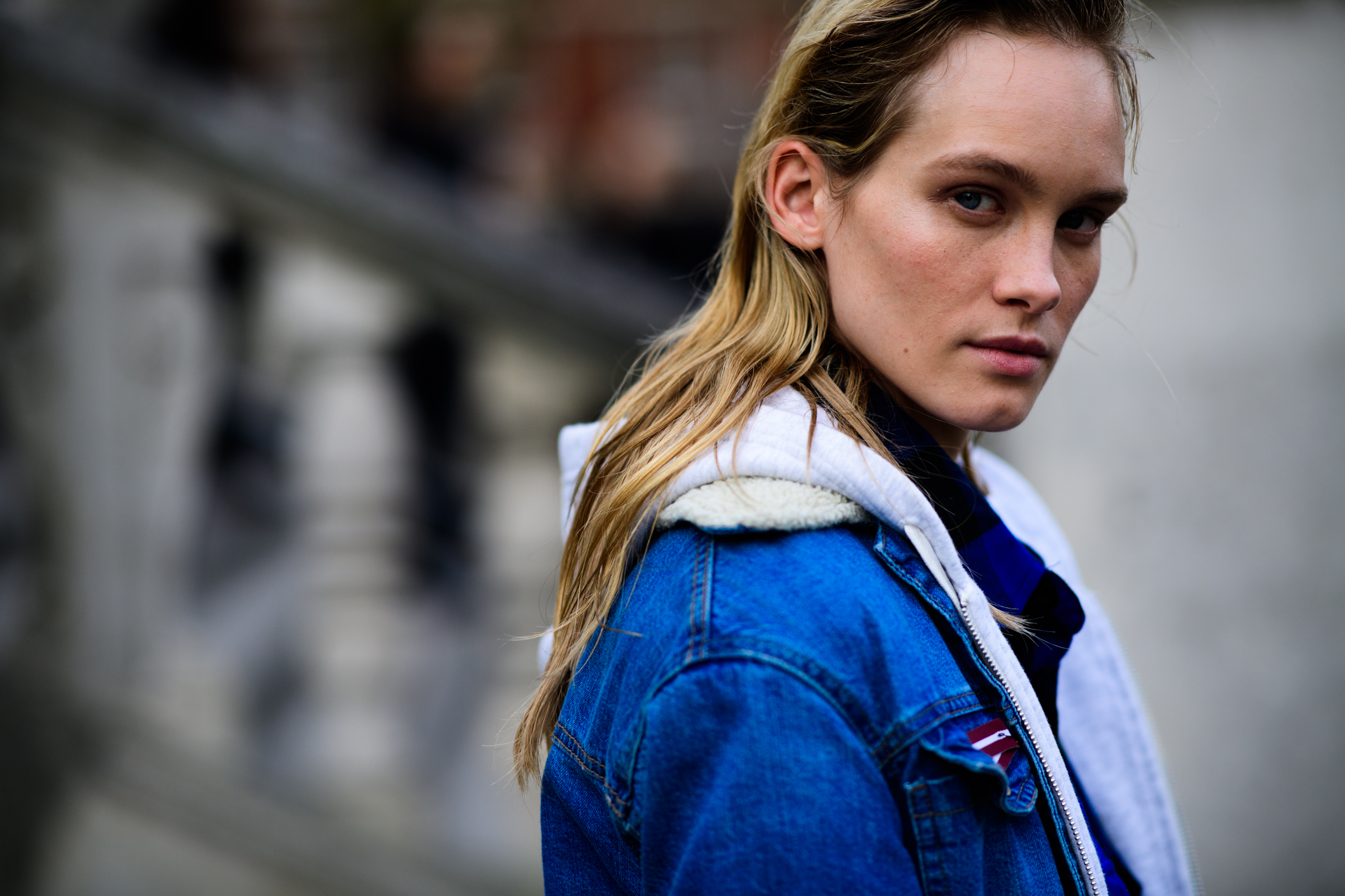 Blonde model wearing denim jacket