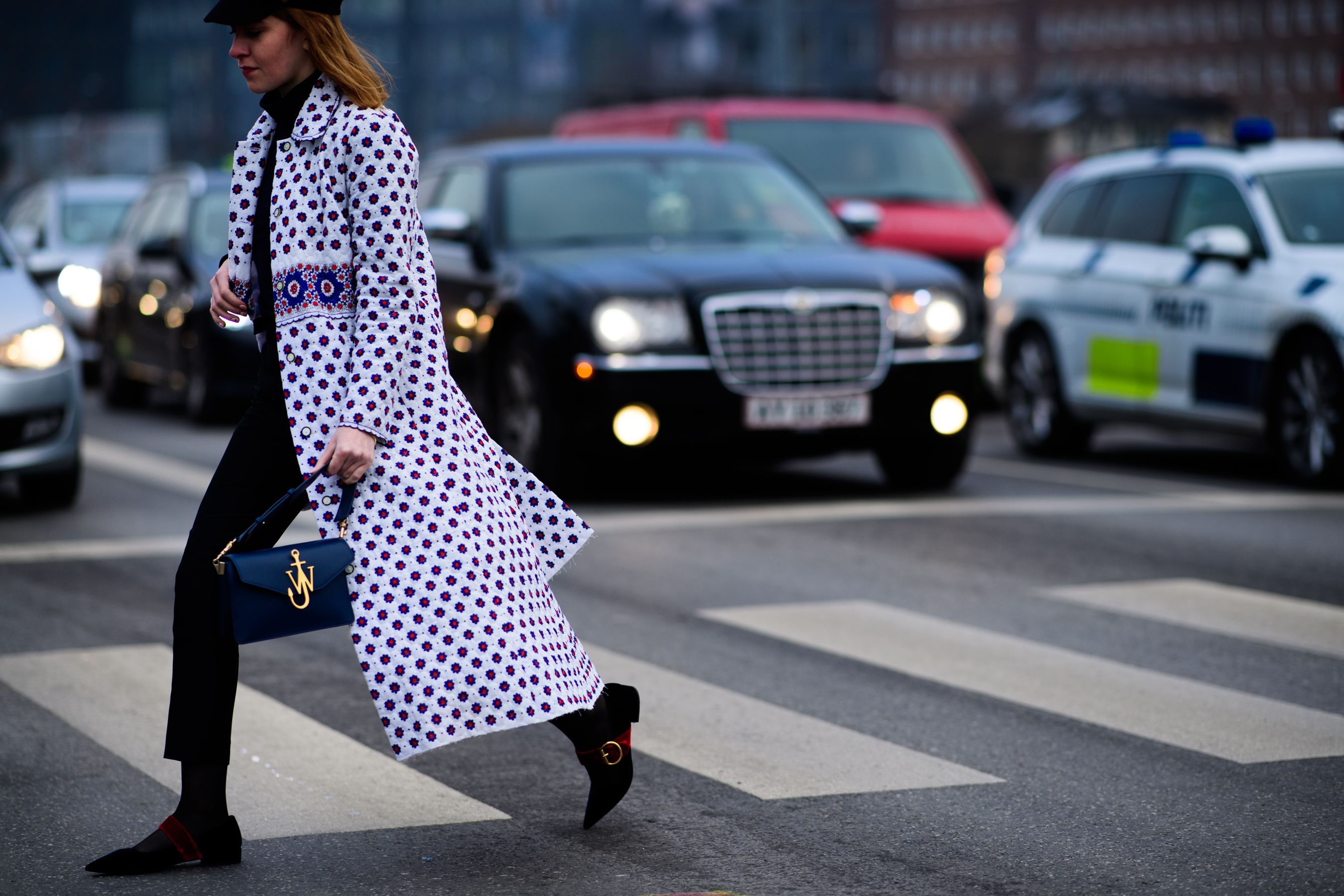 Woman with Gucci shoes and J.W.Anderson bag