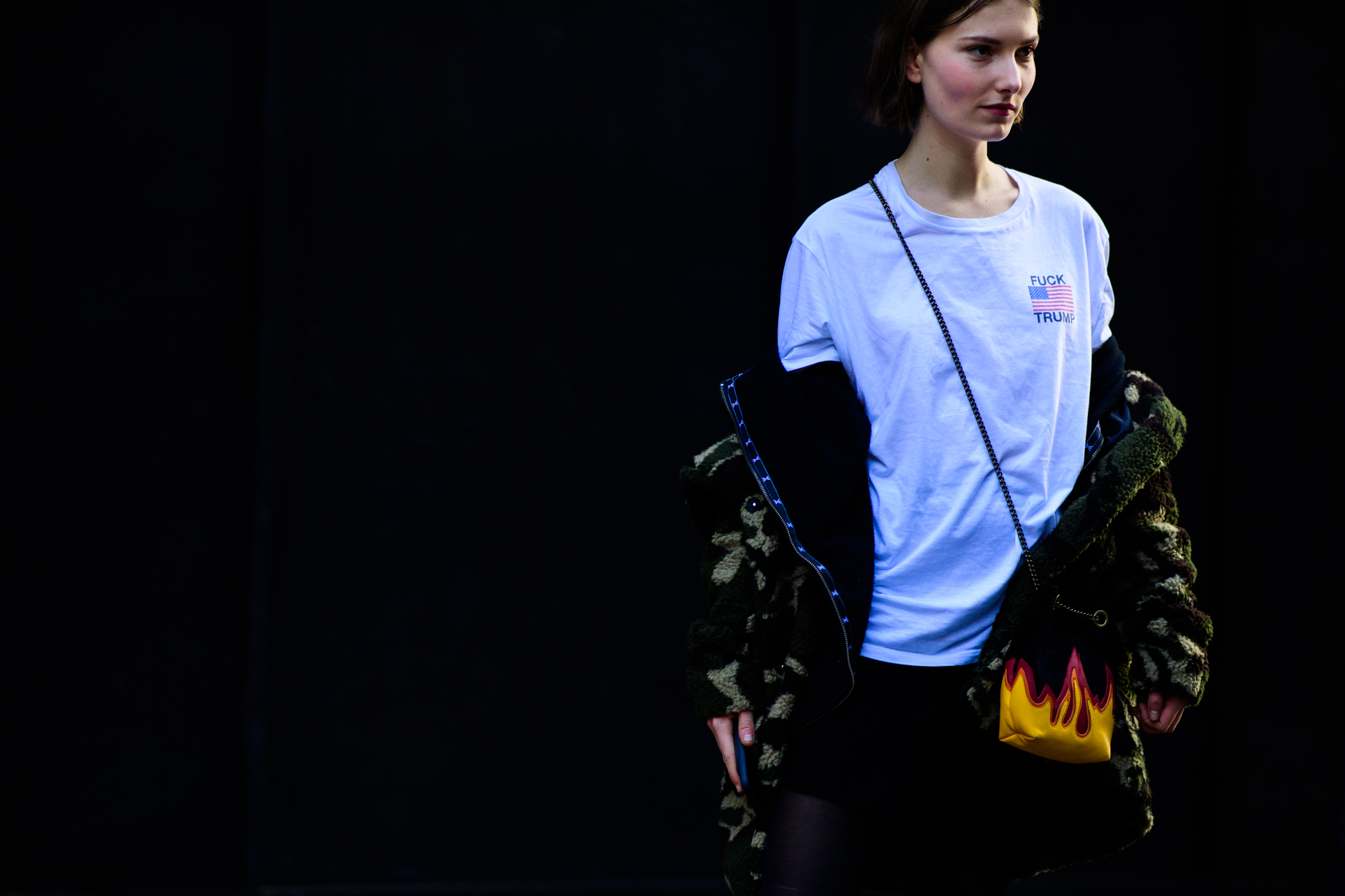 Model wearing camo fleece jacket