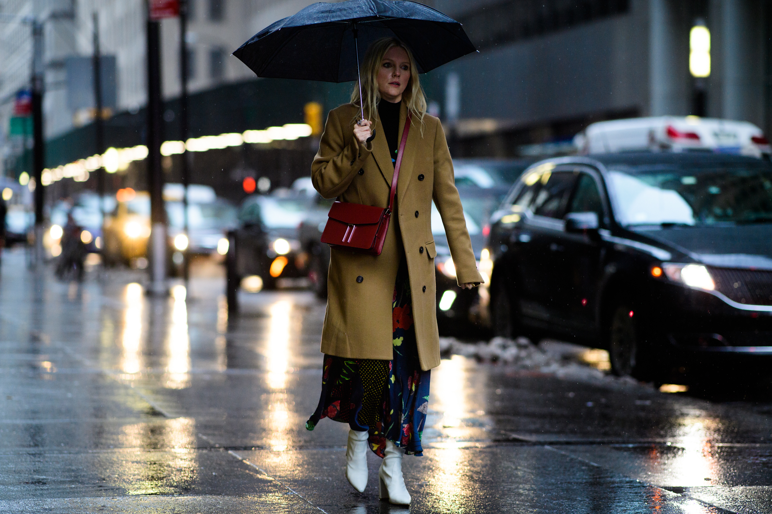 Woman wearing coat and long dress