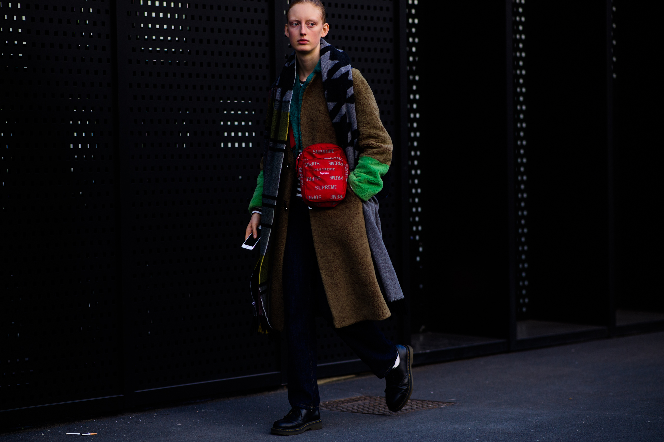 Model wearing supreme bag
