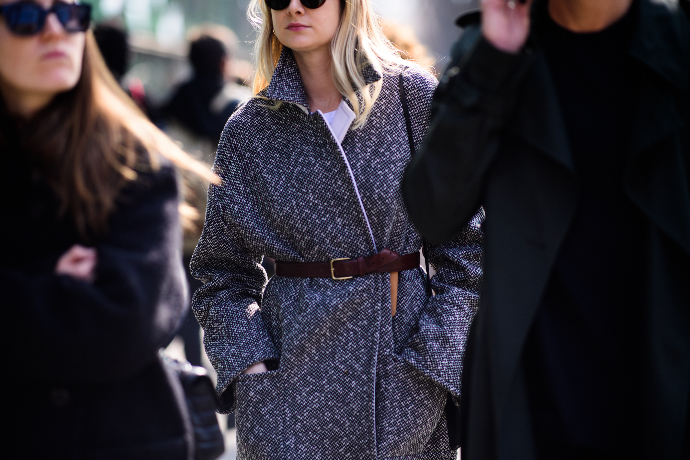 Editor wearing grey coat
