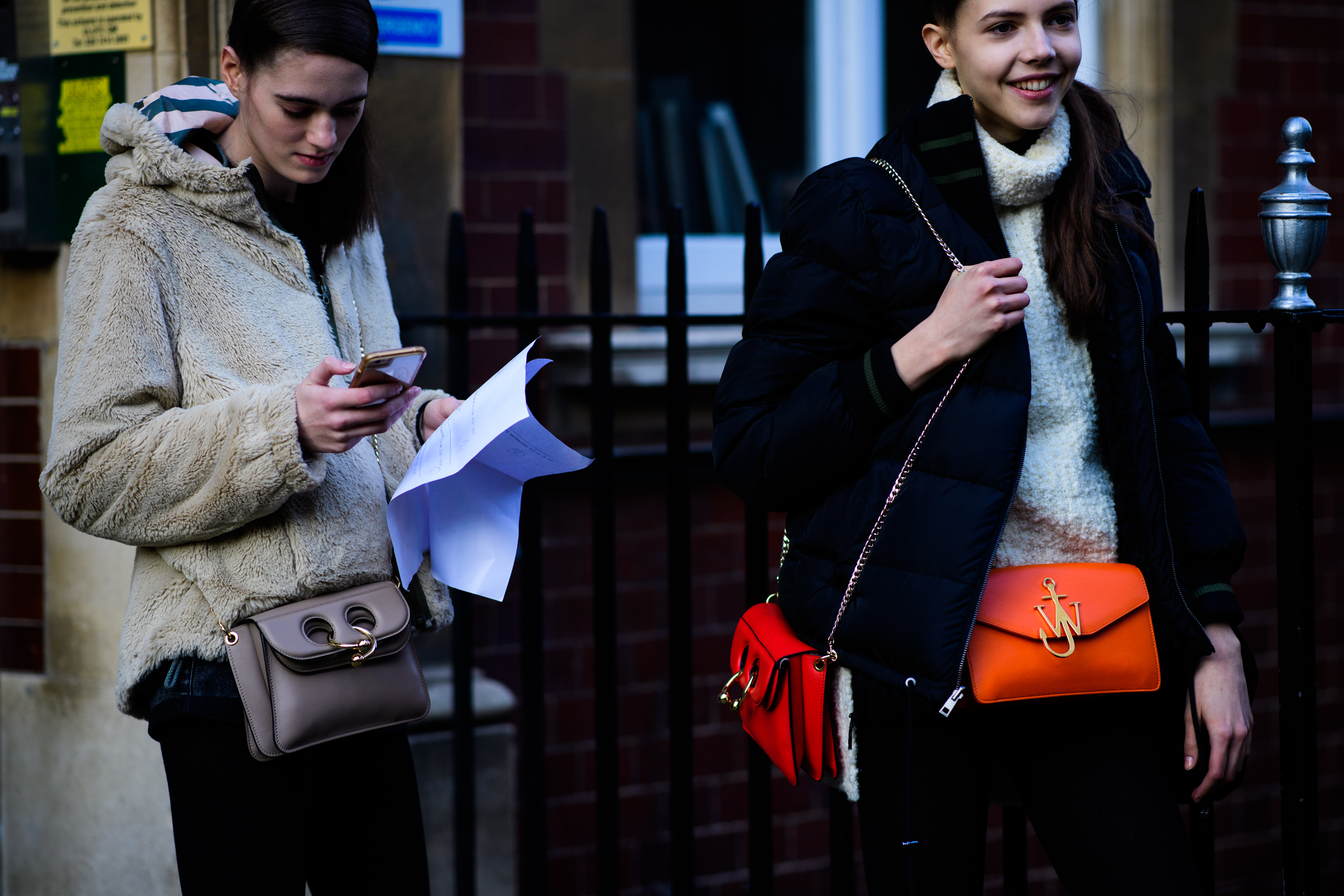 Models wearing J.W.Anderson bag