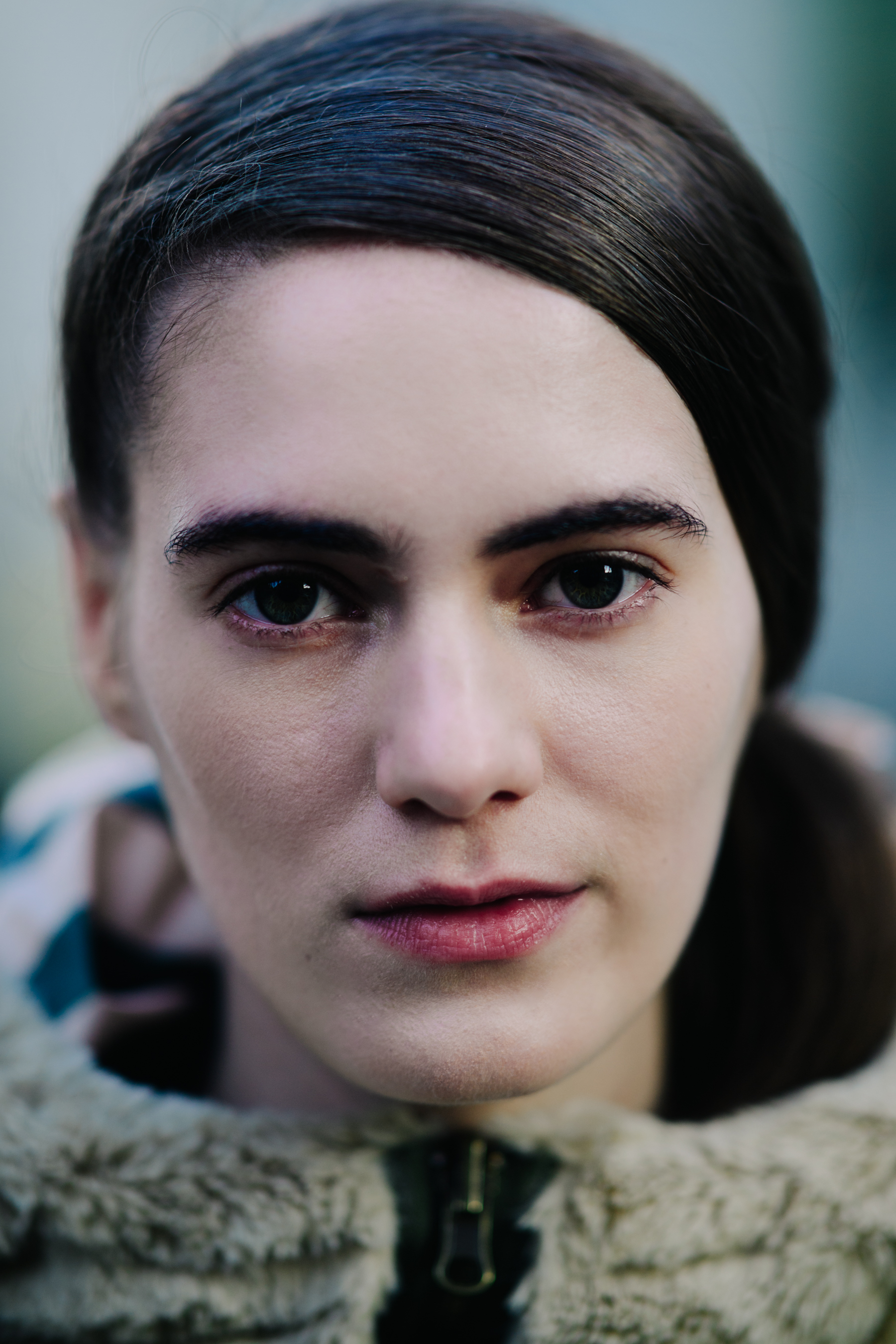 Portrait of model with hairstyle after the show