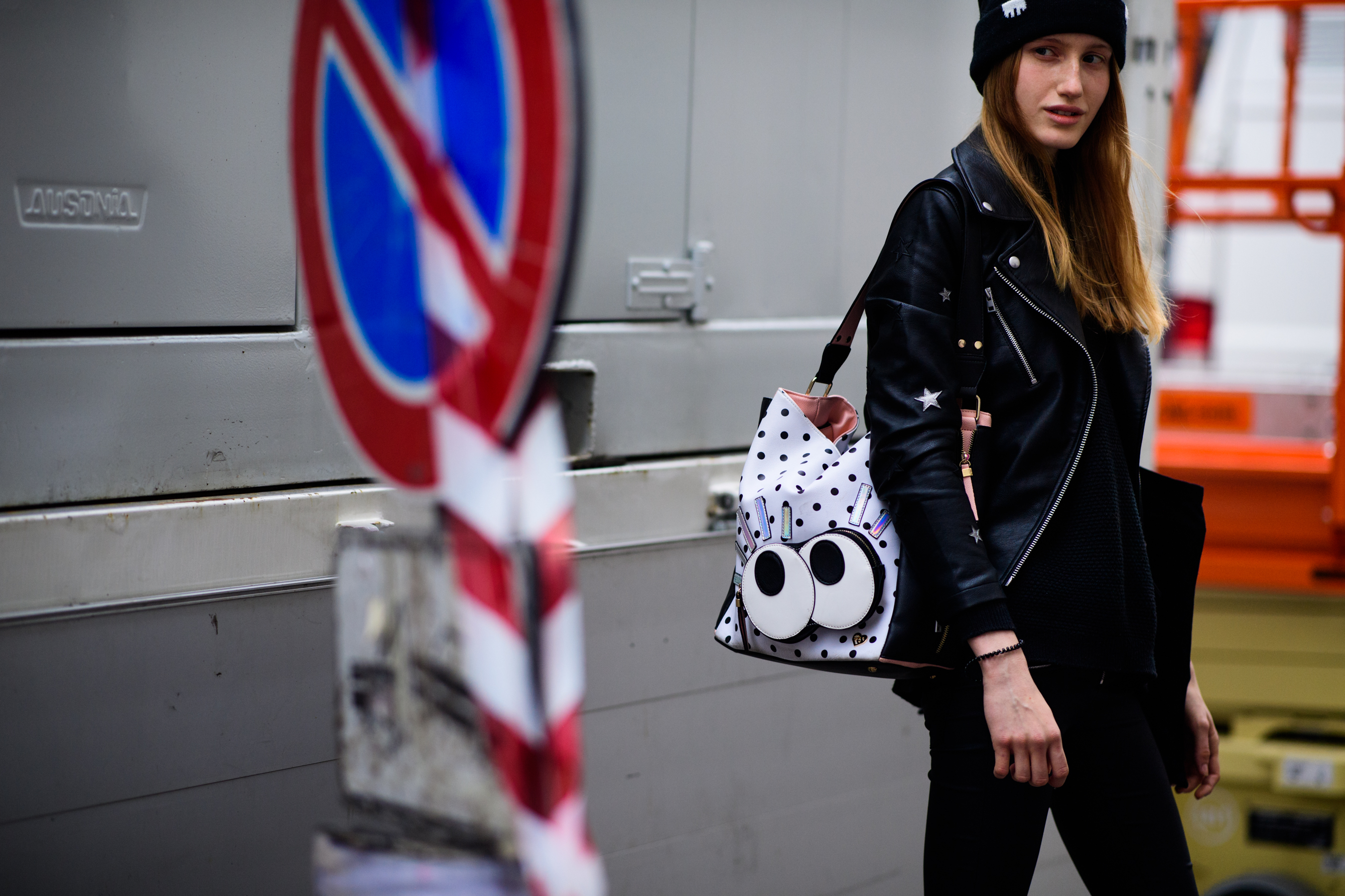 Model wearing bag with eyes