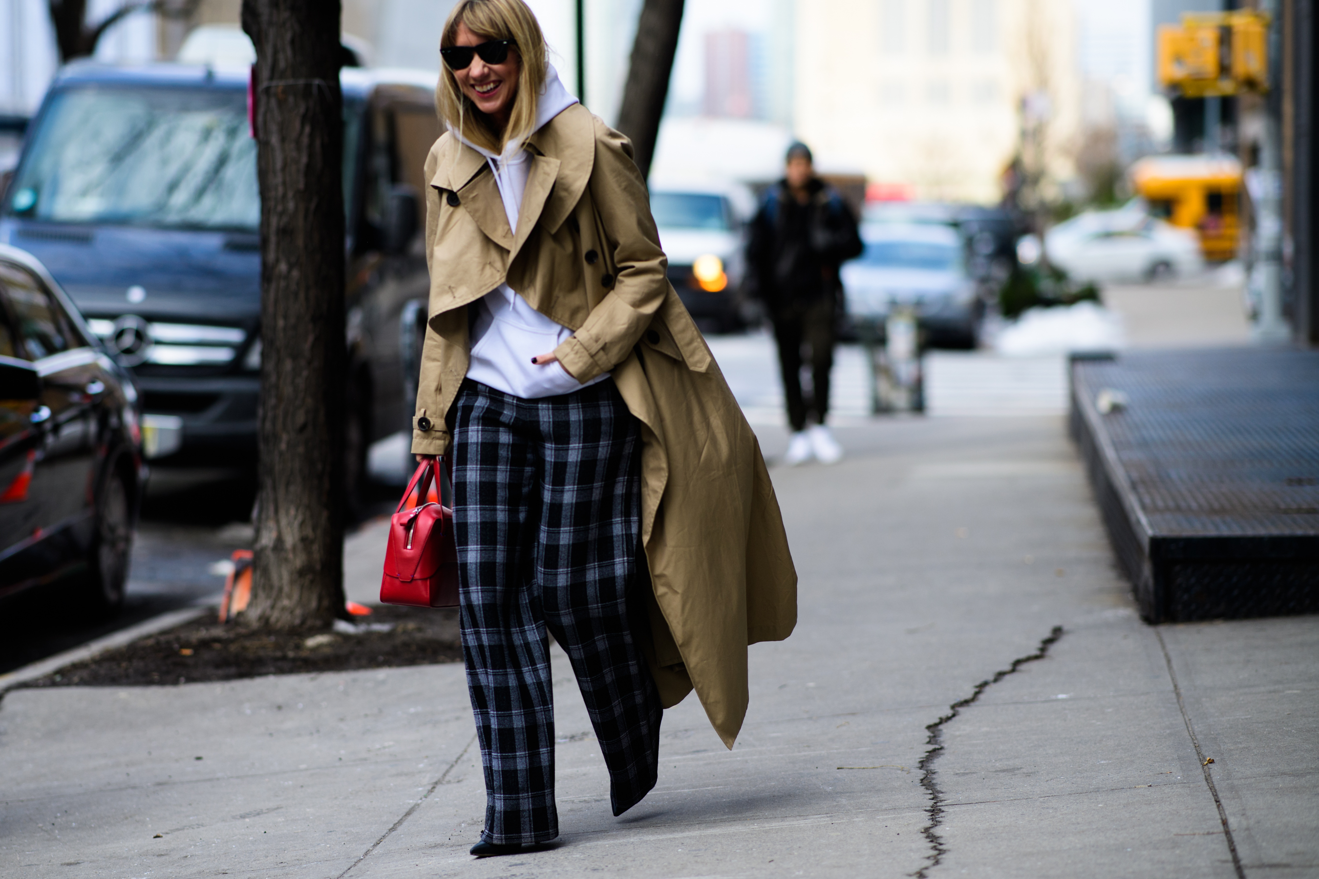 Woman wearing oversized beige coat