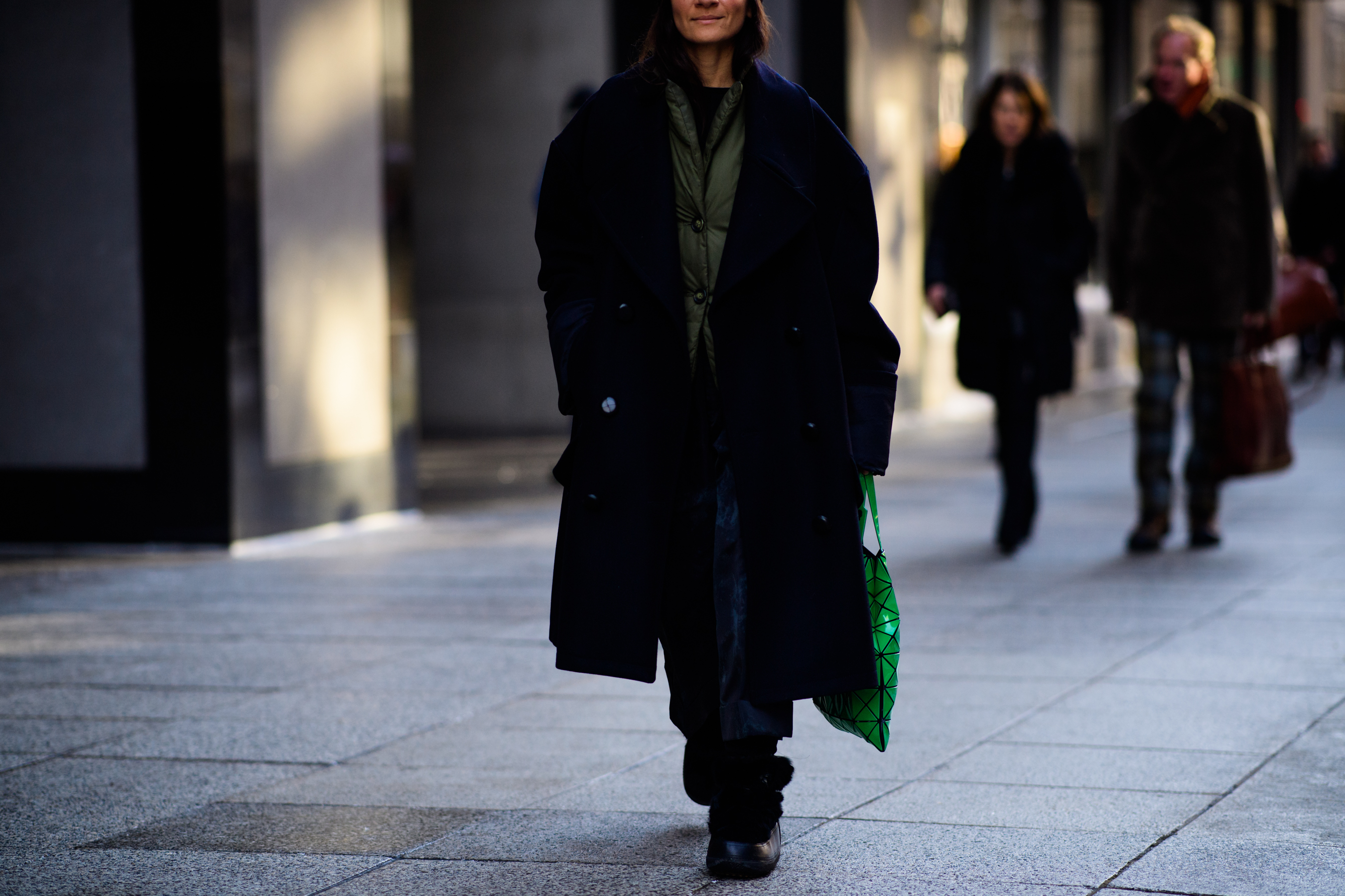 Woman with issey miyake bag