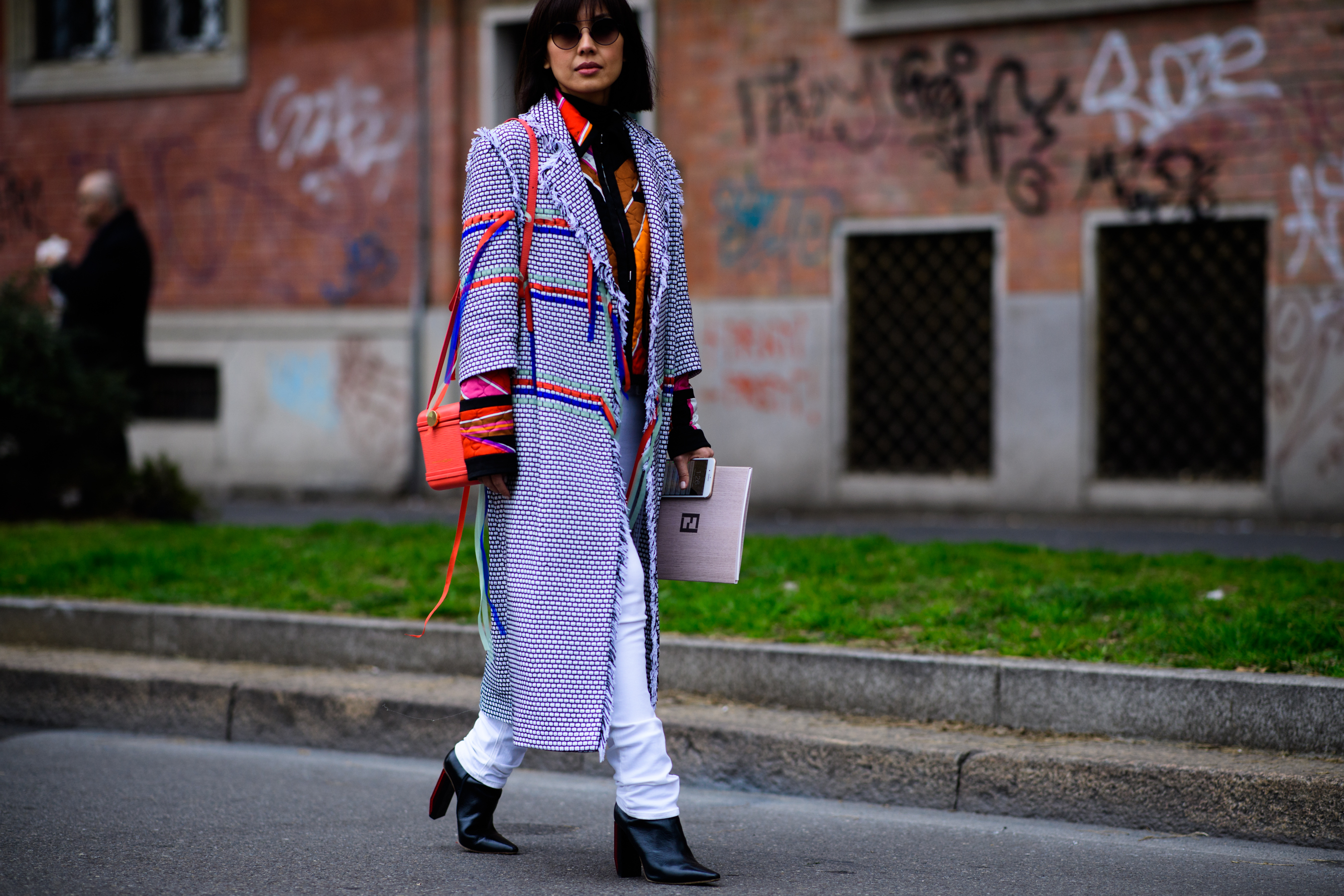 Stylist wearing colorful coat