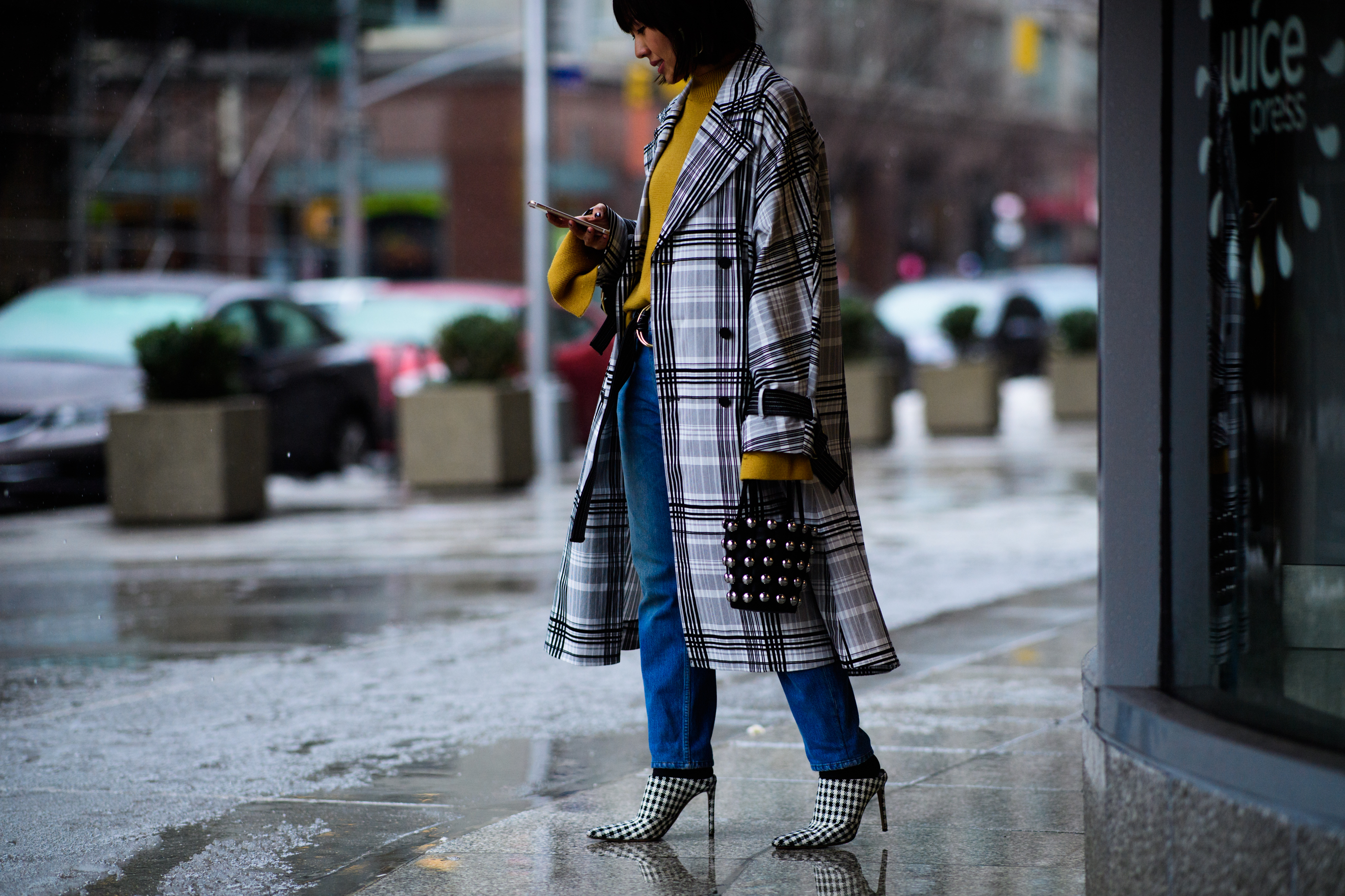 Philippine American editor wearing coat