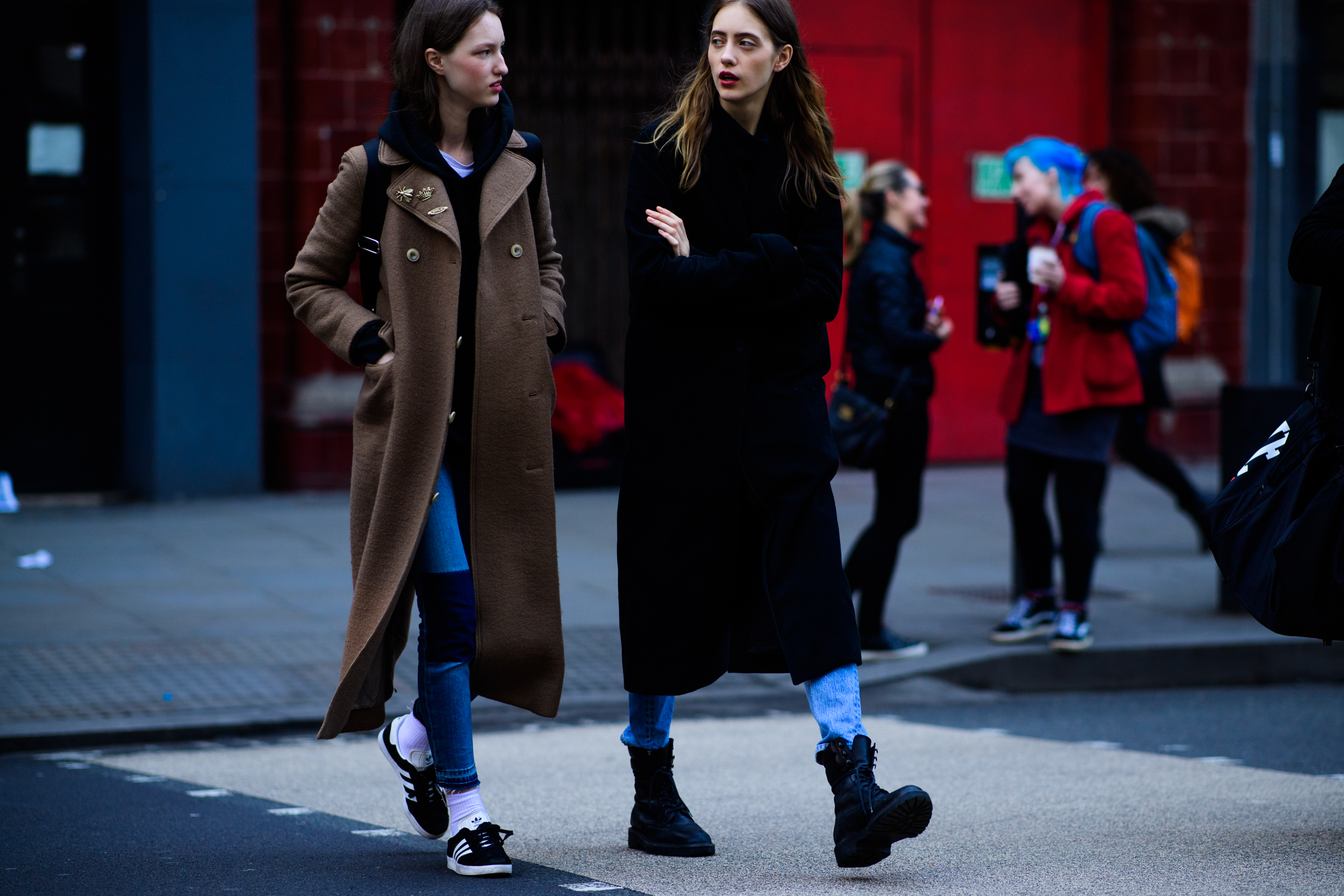 Two Russian models wearing long coats