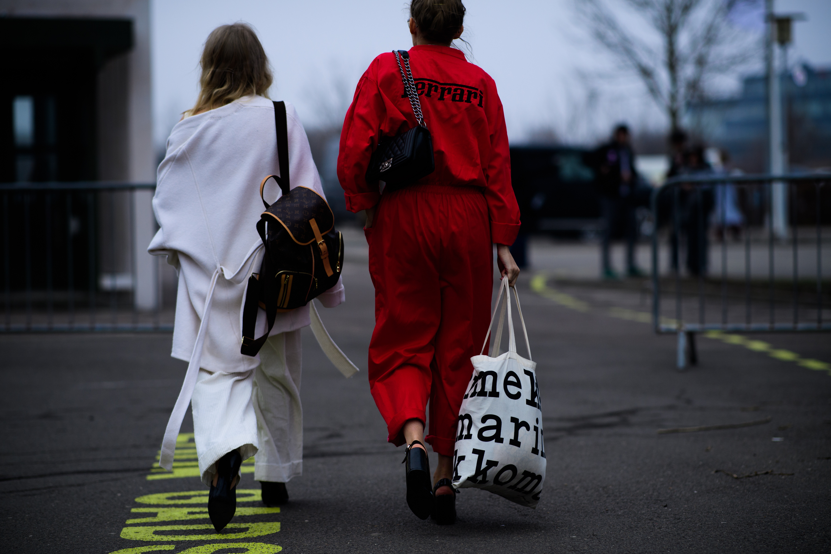 Woman wearing Louis Vuitton bag