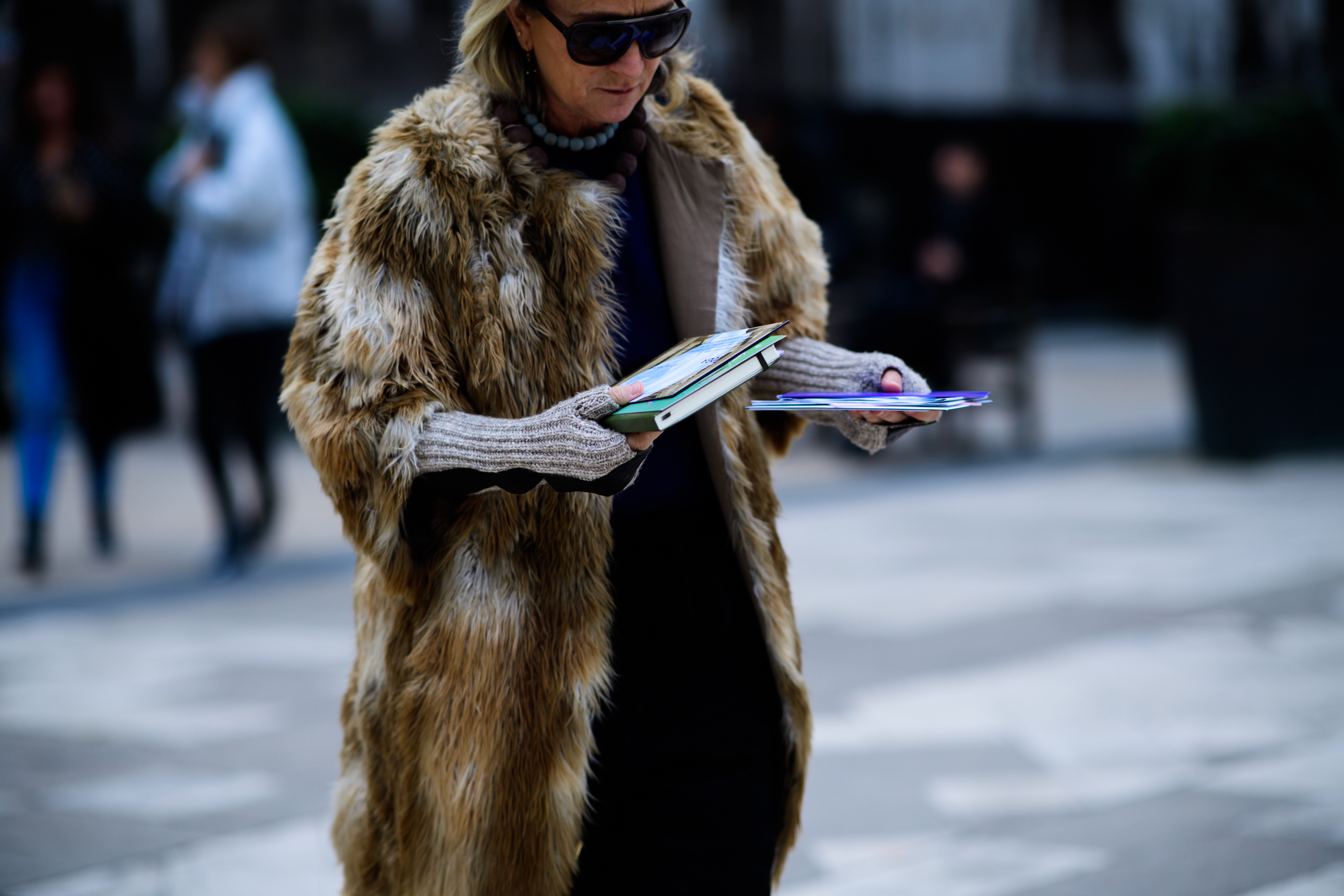 Fashion Director of Vogue UK wearing fur coat